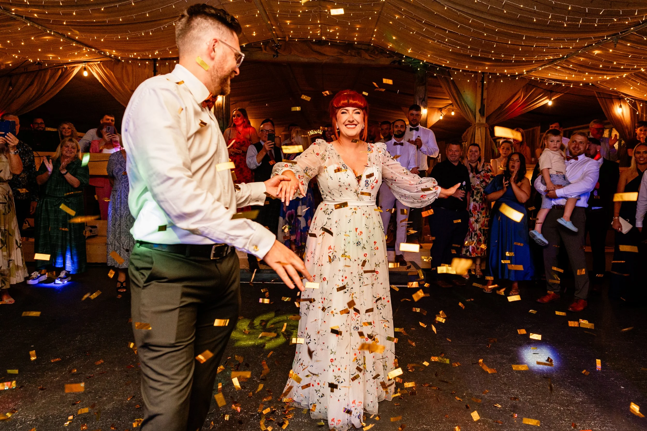 Bride and groom dancing with confetti on the dancefloor on Birmingham wedding day