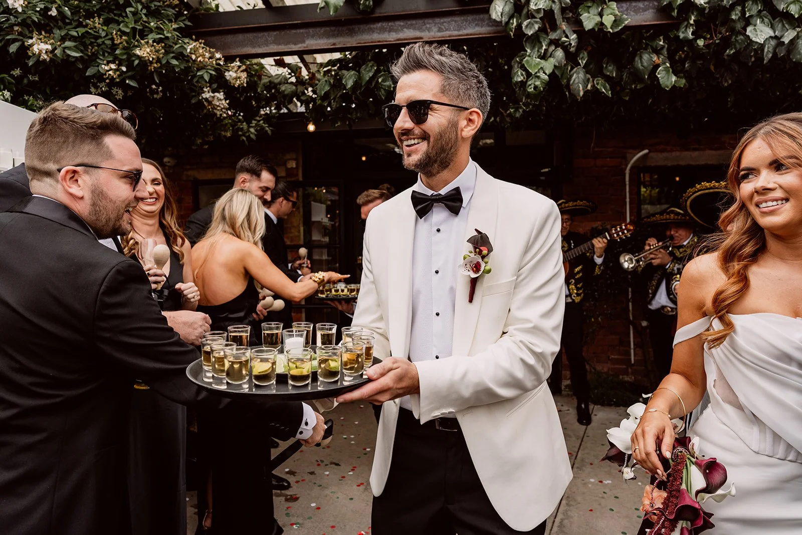 Handing out shots to wedding party during Birmingham wedding