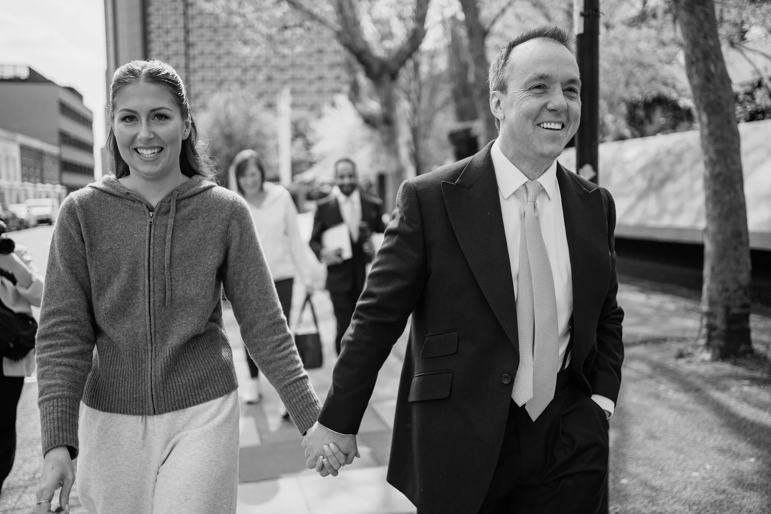 Bride and groom walking to Kindred, their wedding venue