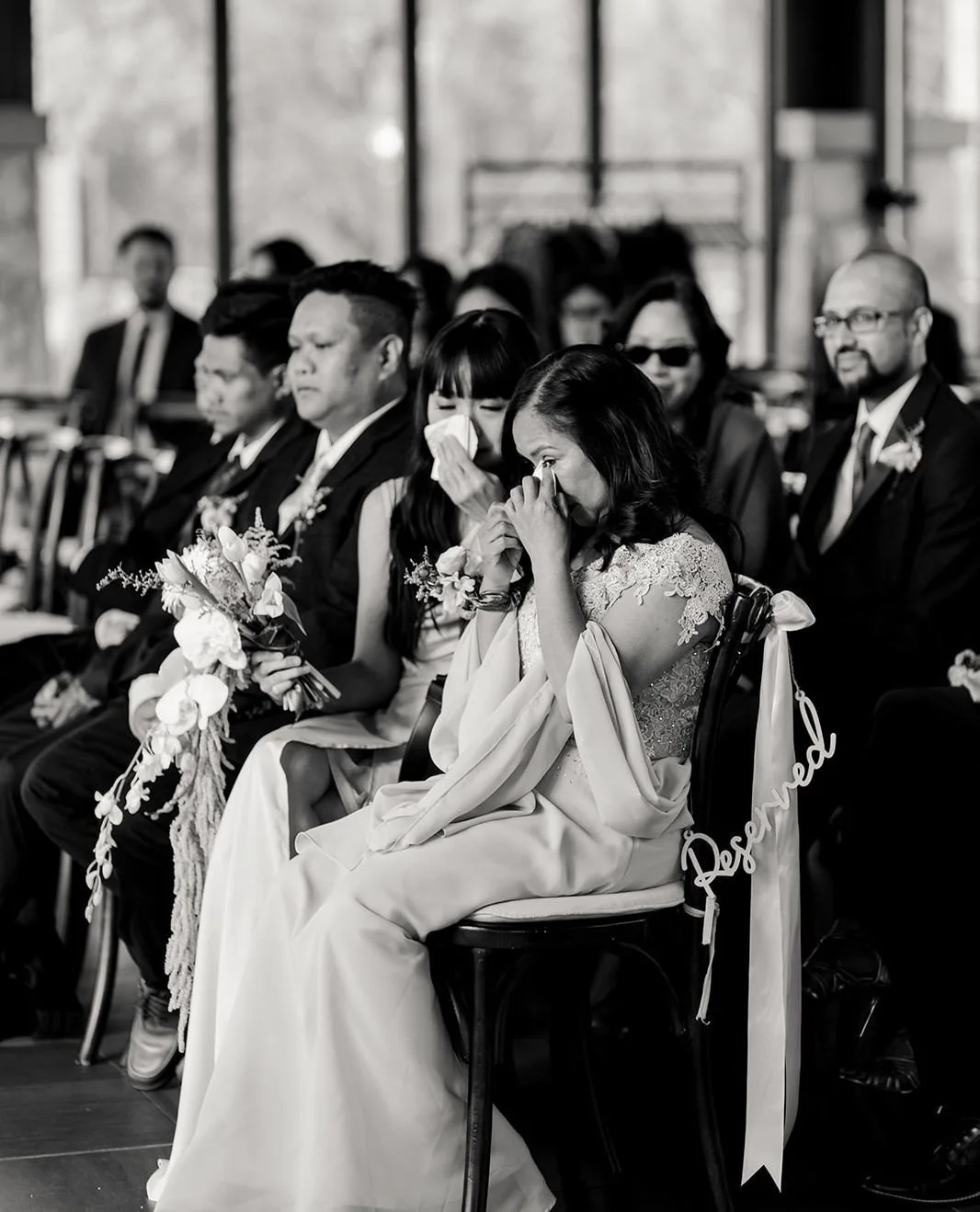 As a photographer, I love when couples do things as THEY see them. ⁠
⁠
N+T chose to have their officiant stand in the middle of the room so everyone could take in the Cambridge Mill backdrop &mdash; and the ceremony instantly felt more immersive.⁠
⁠
