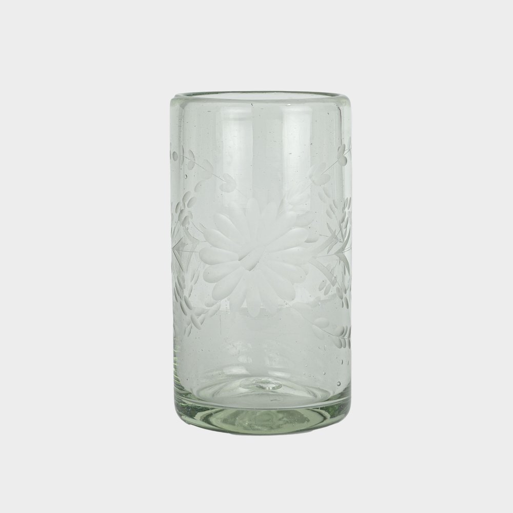 https://images.squarespace-cdn.com/content/v1/5ff5ad8960aa3e486998f529/1666878703300-6U3GNAA000TAZ5SDLEX4/floral-motif-mexican-recycled-glass-drinking-glasses-tall.jpg?format=1000w