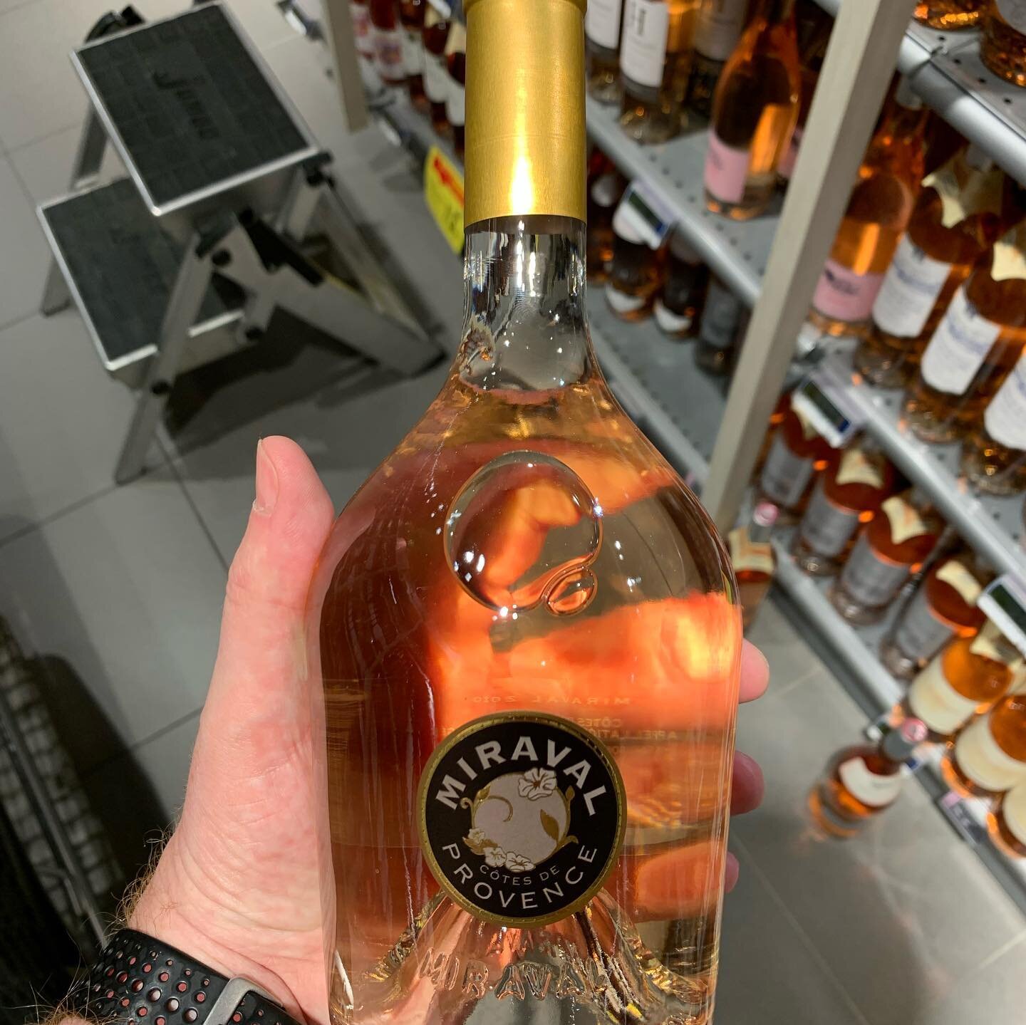 Another beautiful glass bottle from Miraval, a rose wine. The deep punt of the bottle features an embossing of the brand name, this is then visible through the side wall of the glass bottle and the pink tinted liquid. A beautiful and low cost way to 