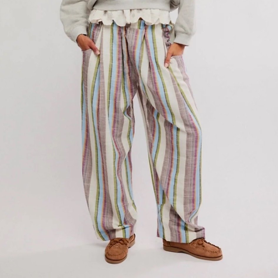 Spring fashion in Providence: model wearing striped linen pants.