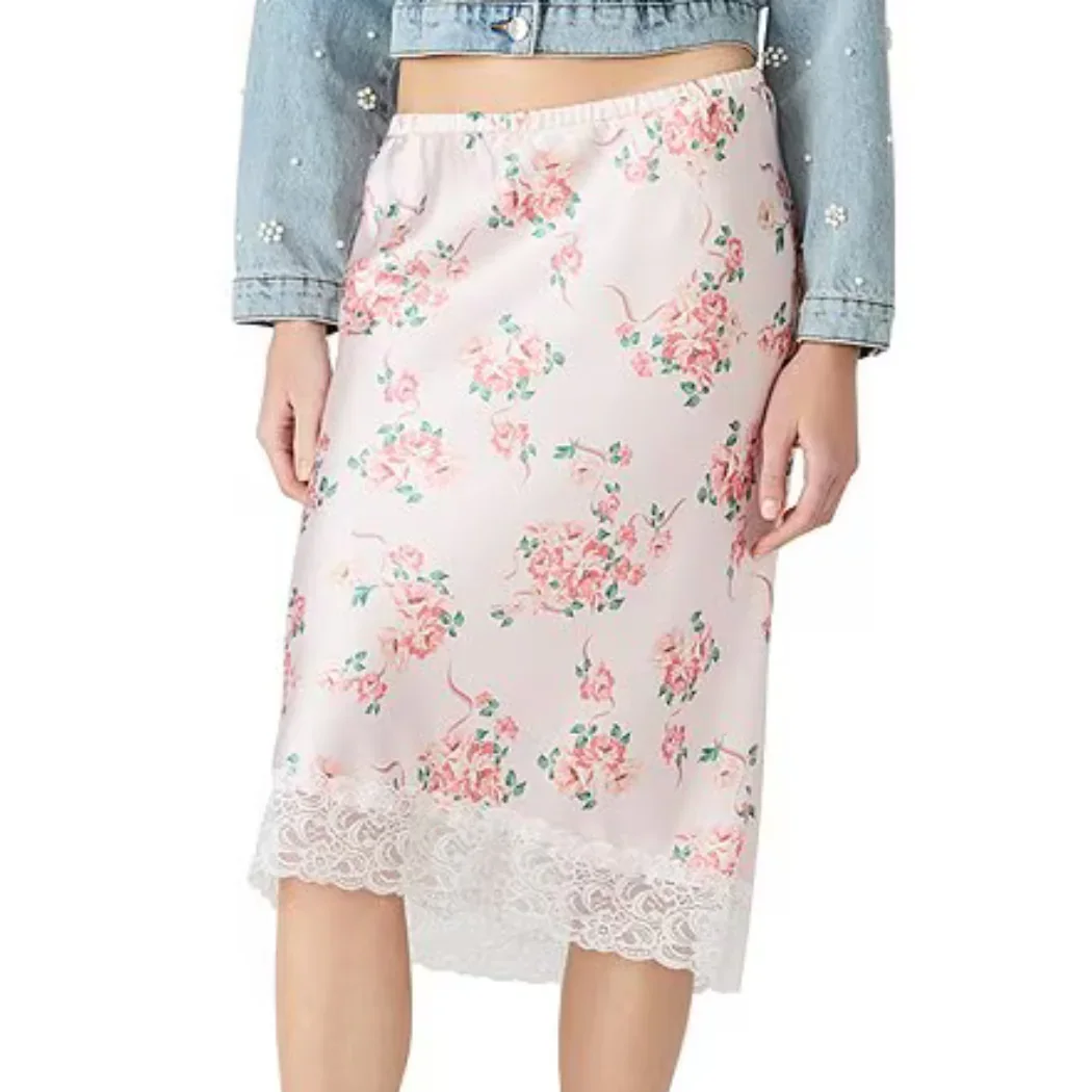 Spring fashion in Providence: A peach colored silky skirt adorned with pink flowers and trimmed with lace.