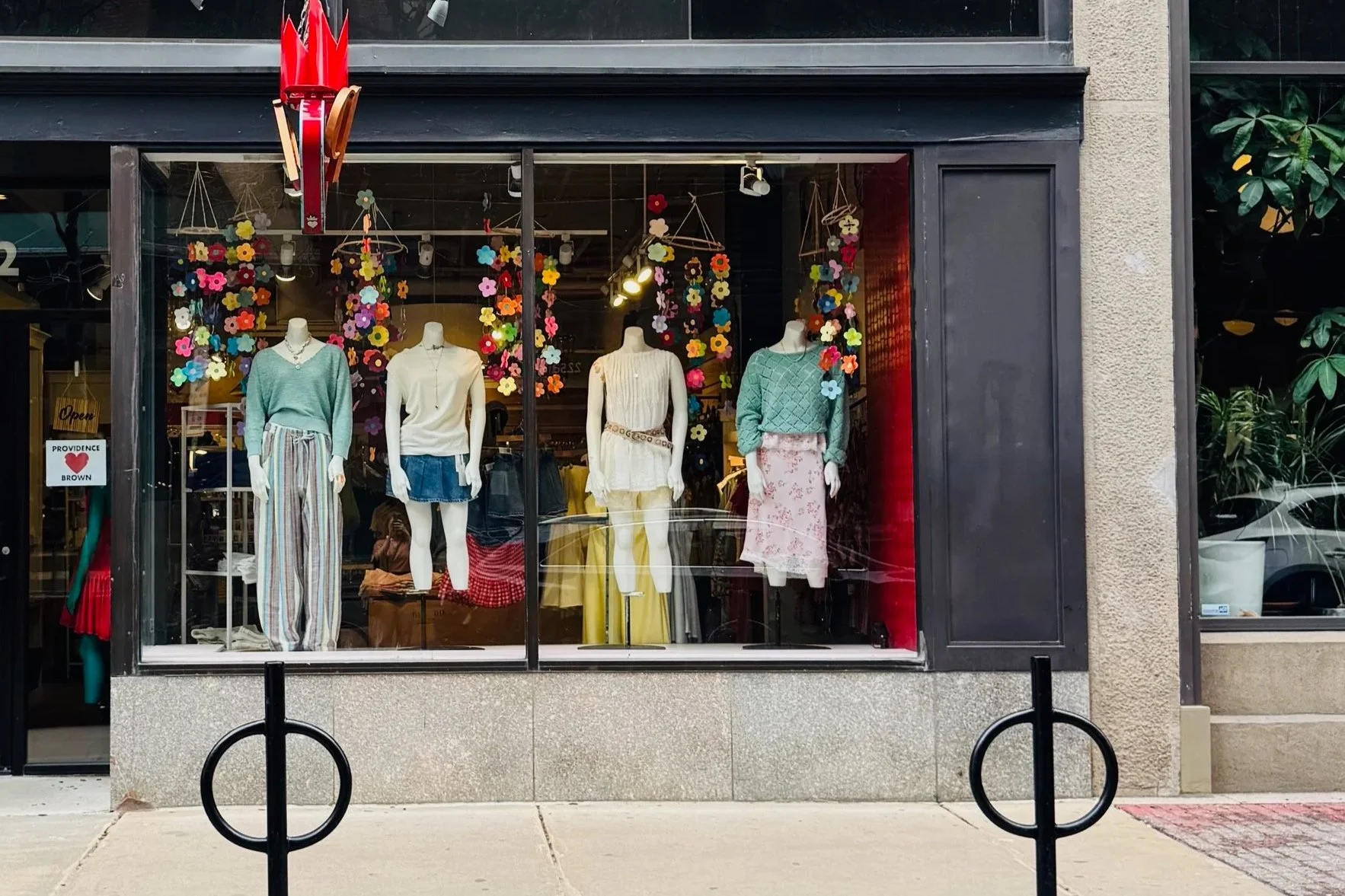 Spring shopping in Providence: the Queen of Hearts storefront featuring mannequins modeling spring clothing