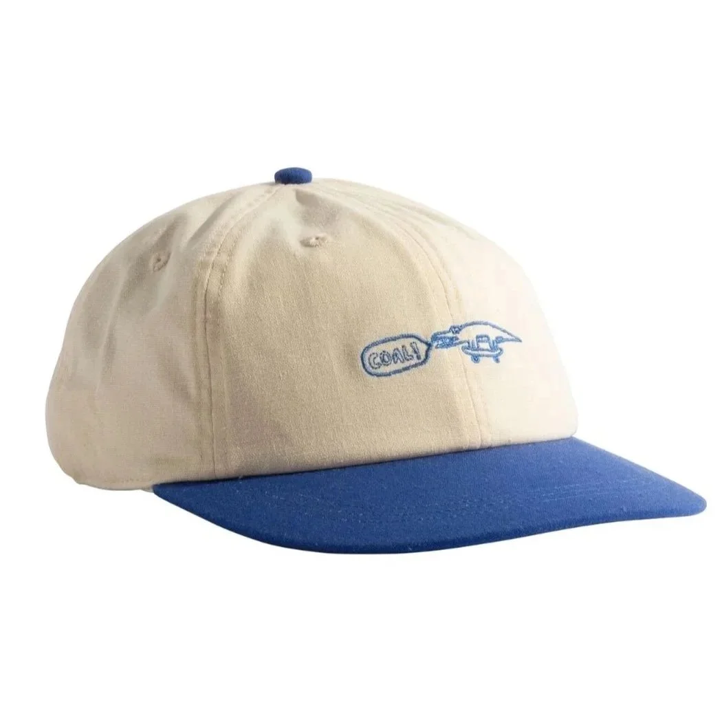 Spring fashion in Providence: an ivory hat with a blue brim and an alligator with the word "coal" in quotations.