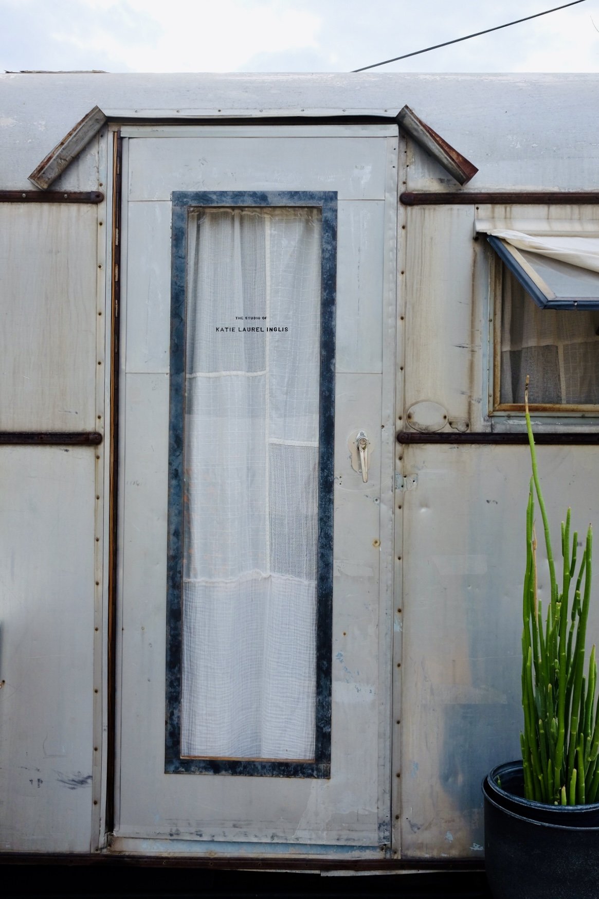 Studio door with hand-painted sign