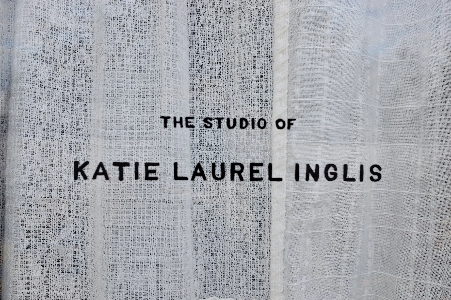 Close-up of studio door signage