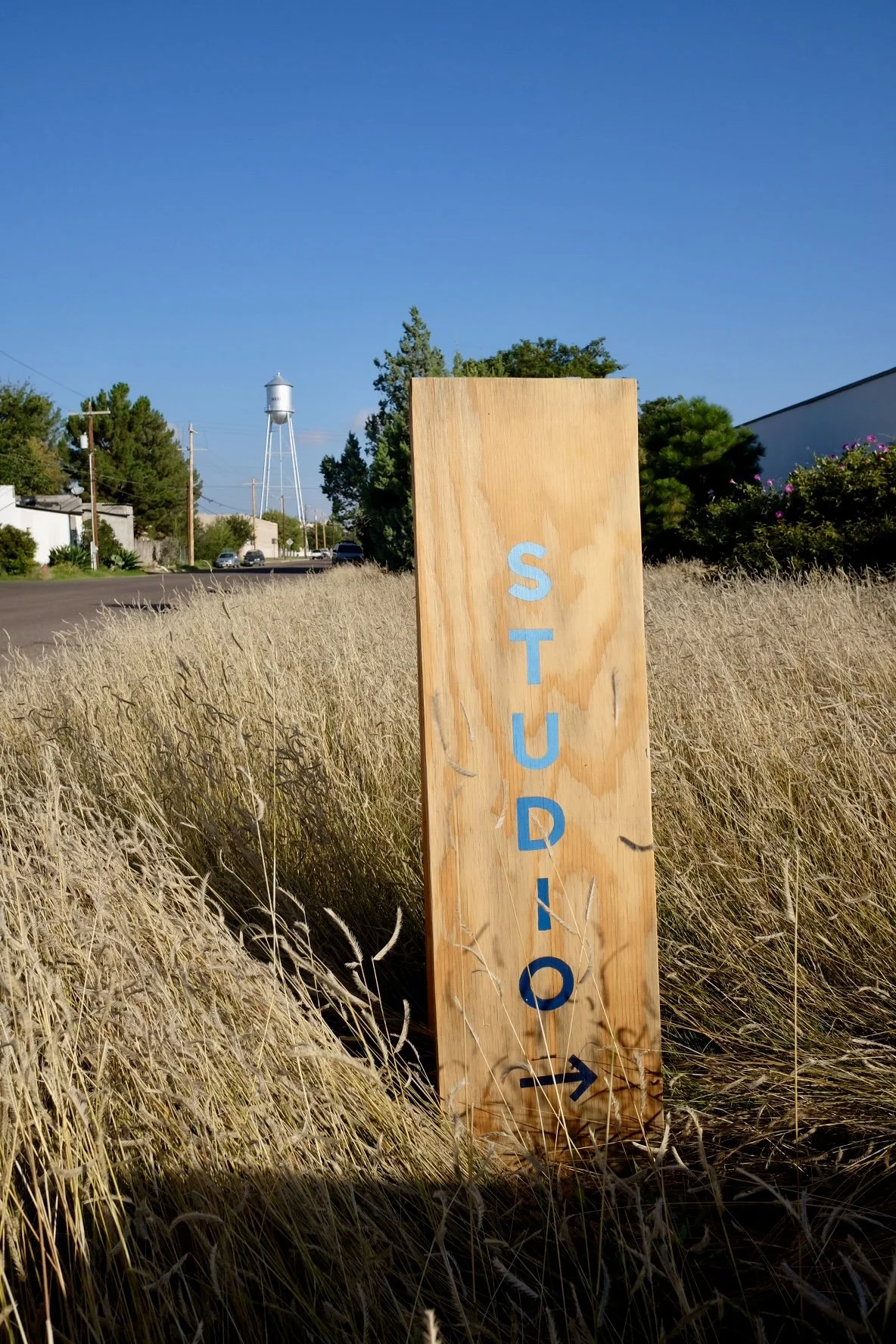 Hand-painted studio sandwich board sign