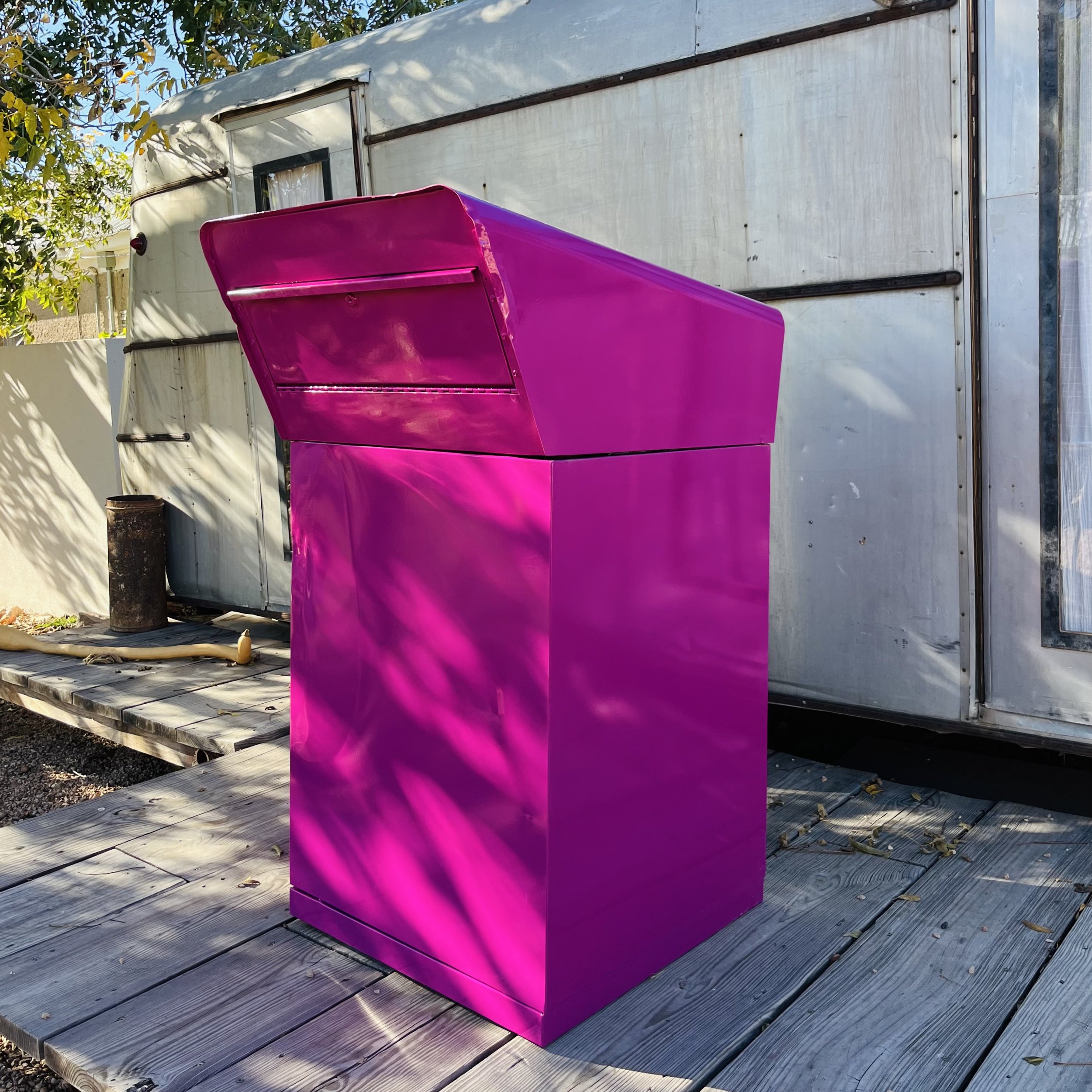 The book drop was powder-coated in 'Marfa Shorthorn Purple' by local artist Cody Barber