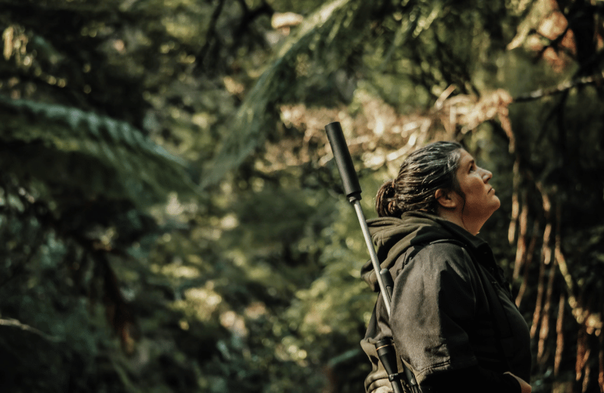 Jannine Rickards of Huntress Wines out in the New Zealand native bush
