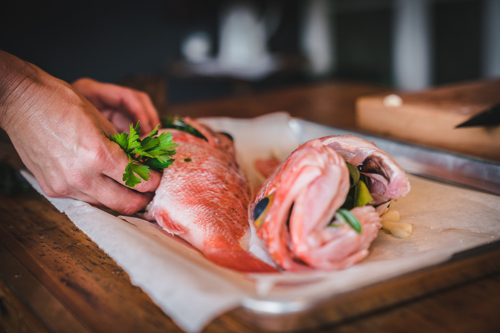 Fresh sea perch being prepared at Hapuku Kitchen Cooking School, New Zealand