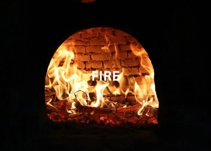 The hand-built pizza oven in action at Hapuku Kitchen cooking school, New Zealand