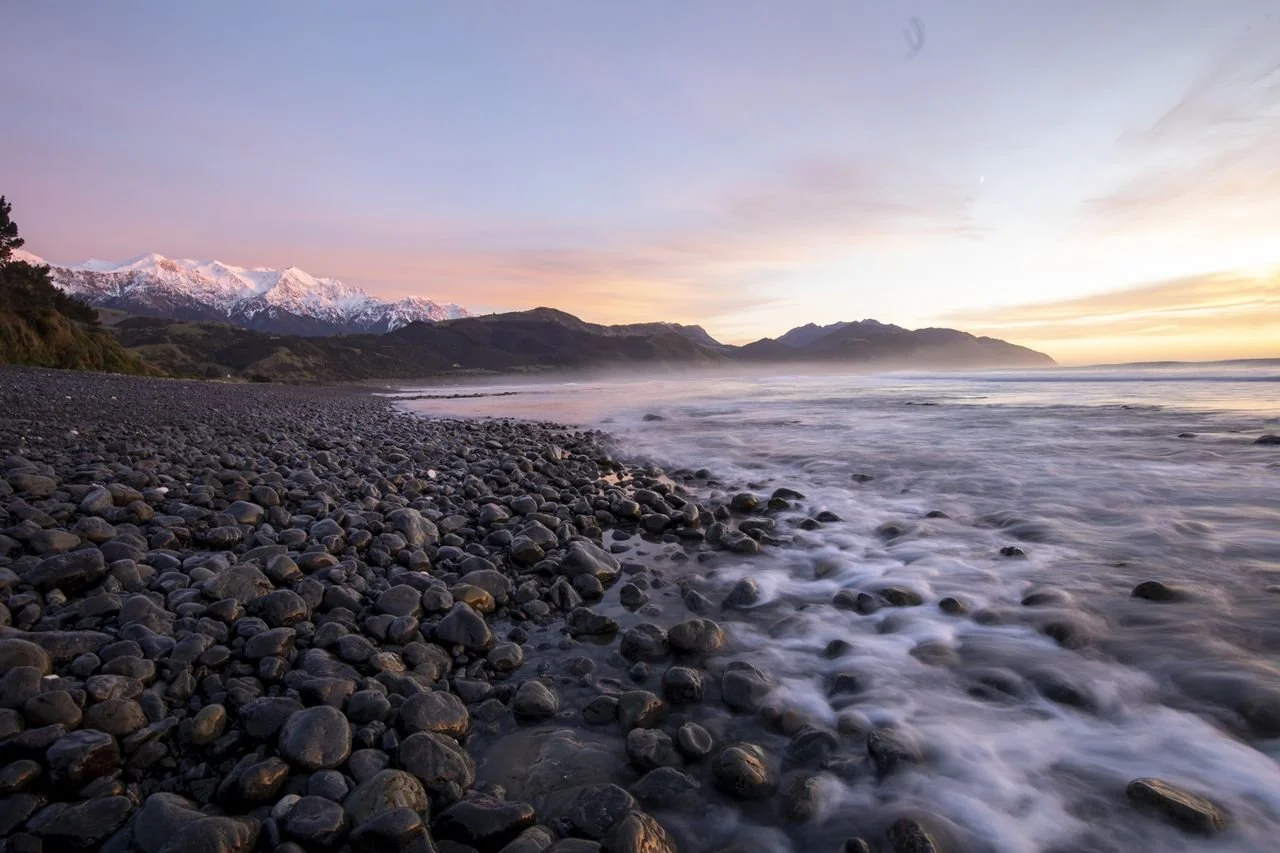 View of Kaikoura's Dramatic Coastline and Snow-capped Mountains