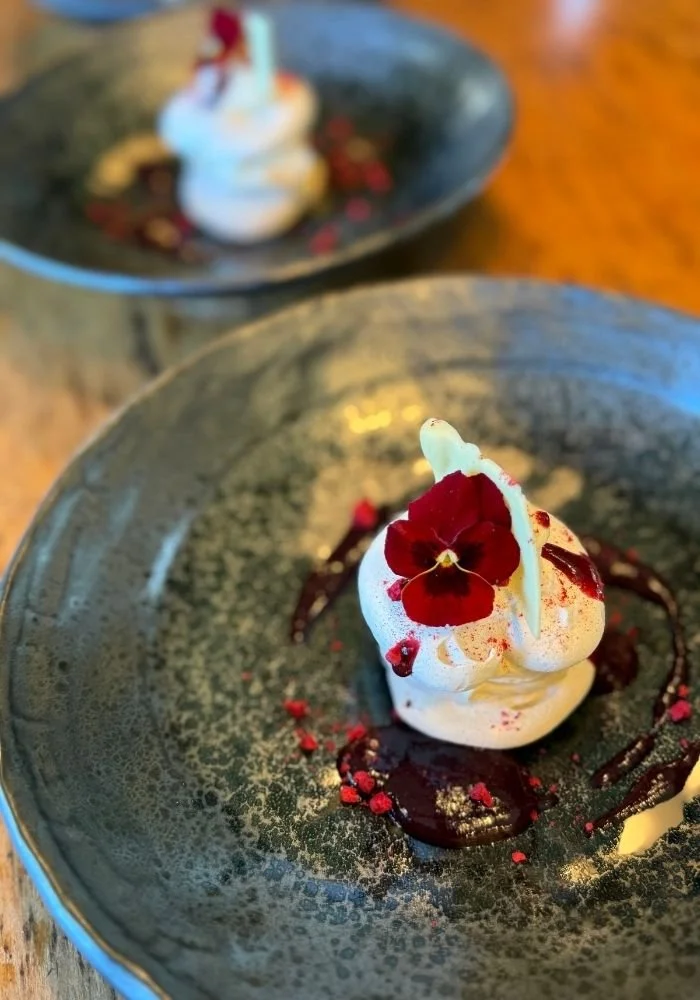A dessert made from the Hapuku Kitchen produce of plums, rhubarb, eggs, raspberries