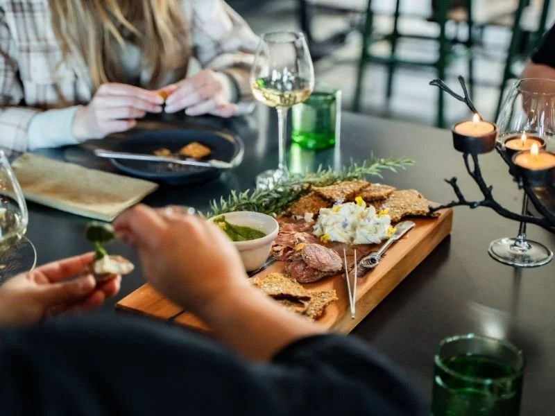 Guests enjoying dishes they have made from scratch from ingredients they've picked themselves