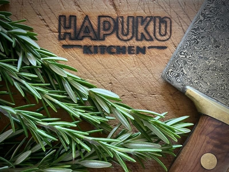 Hapuku Kitchen chopping board featuring a New Zealand hand-made chef knife