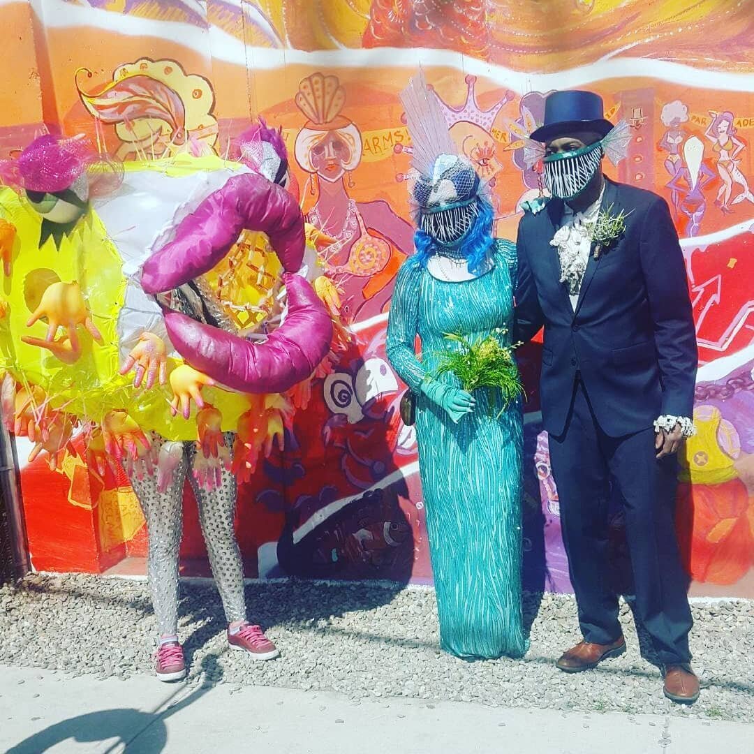 I marched with my friends and the theme of our group was “Taking the Plunge.” They are bride and groom angler fish, handmade by @badashcostumes.