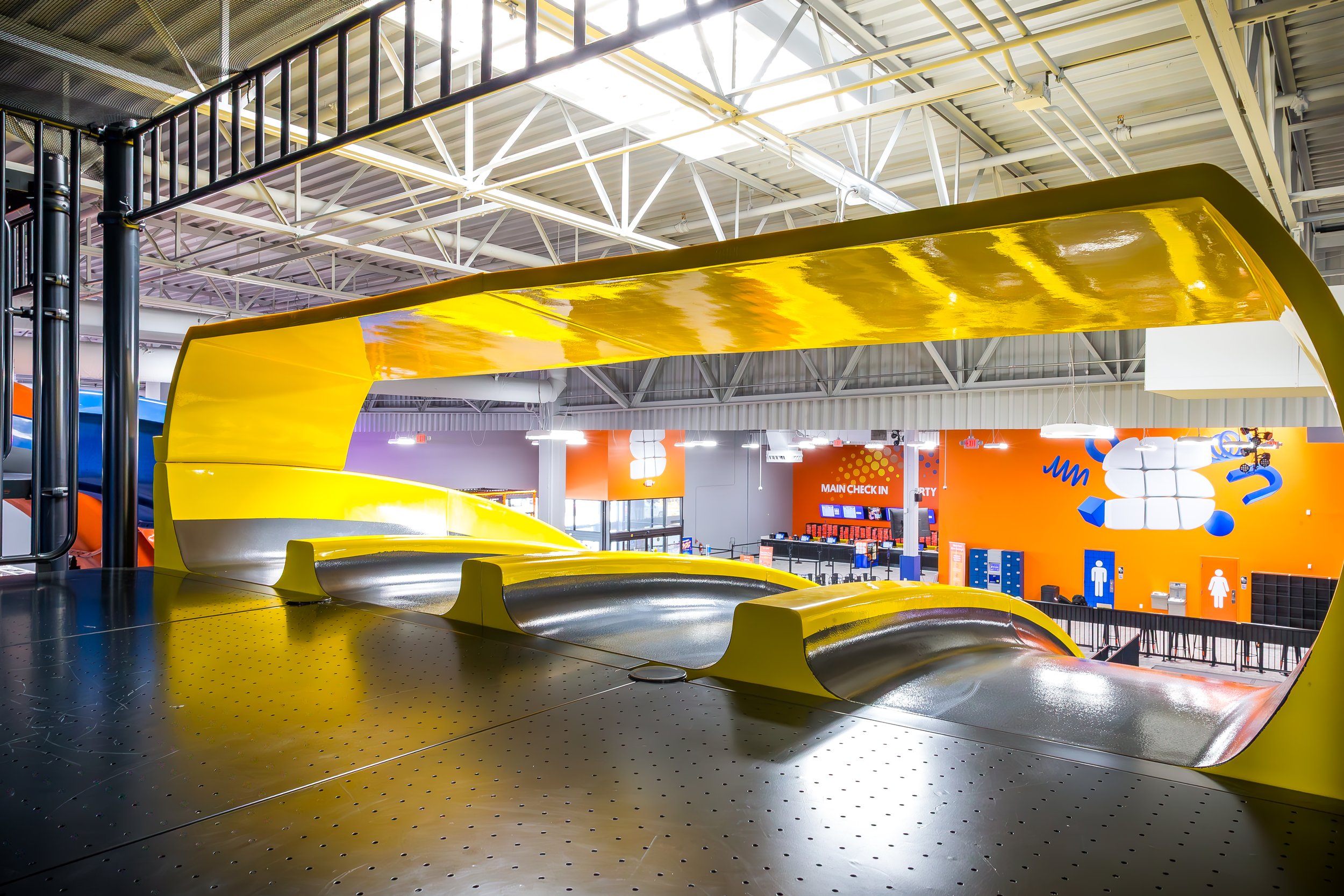 sky-zone-wichita-ks-yellow-slide-platform.jpg