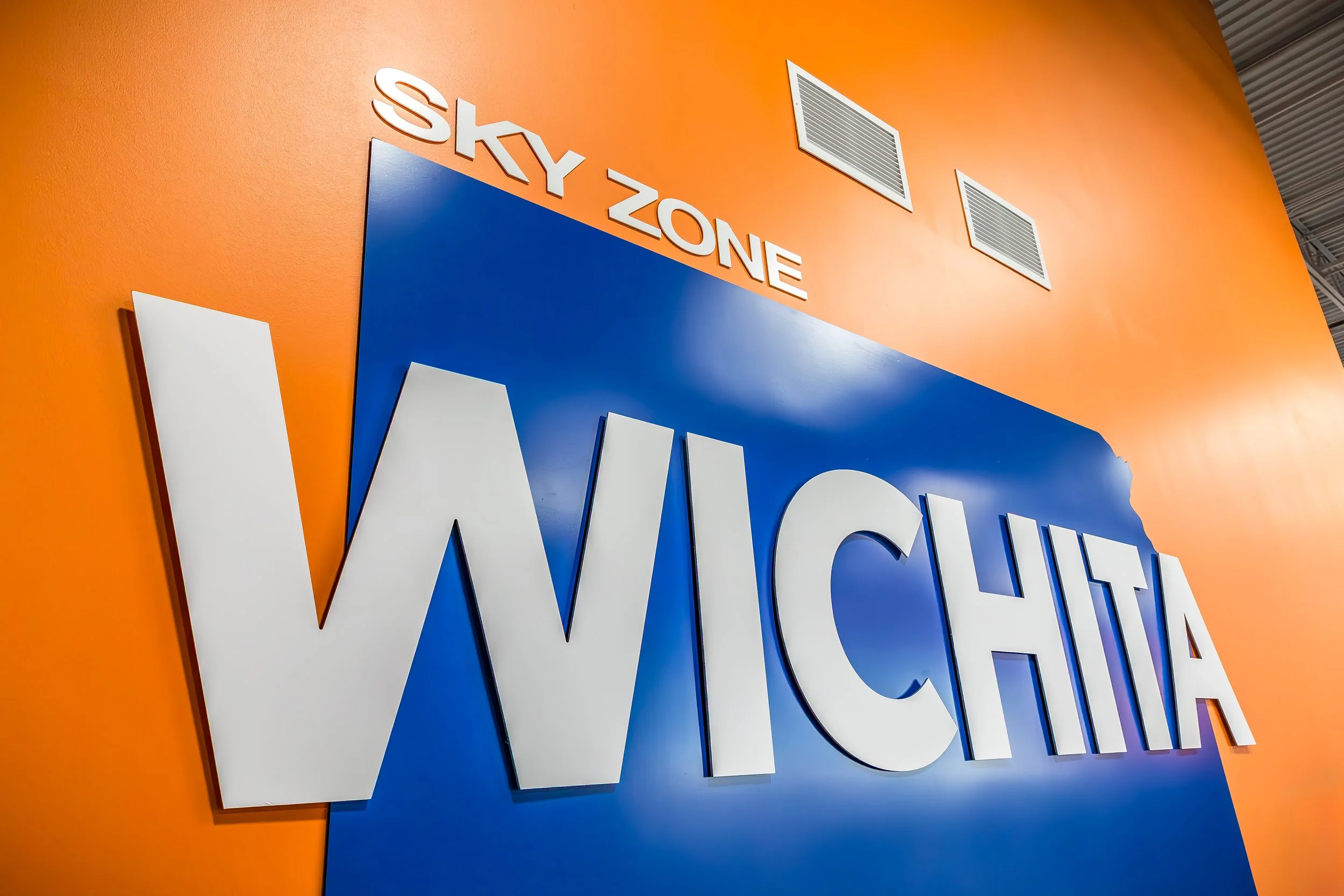 g4-construction-management-sky-zone-wichita-ks-branded-wall-angle.jpg