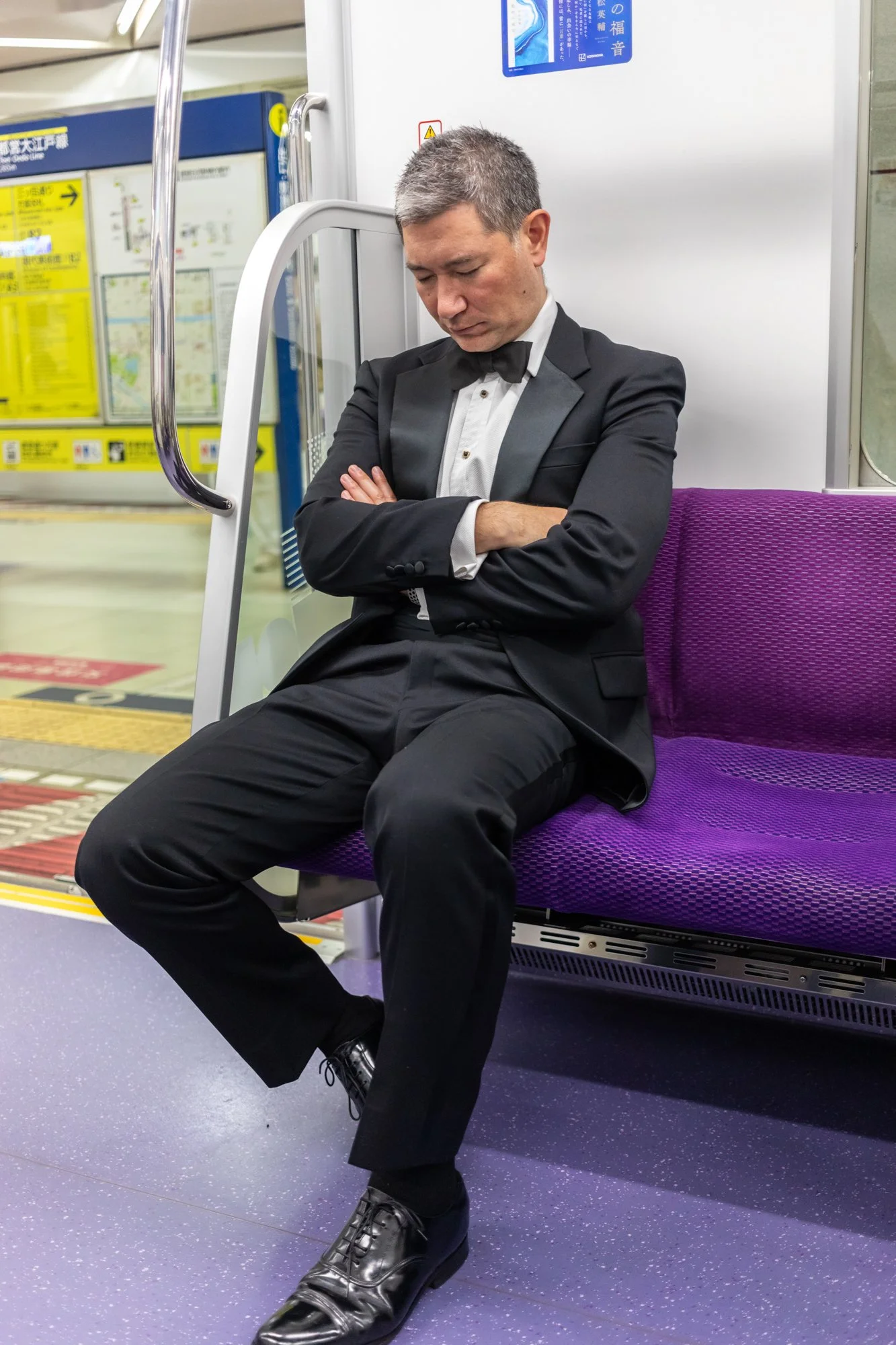 7. Man sleeping in train.jpg