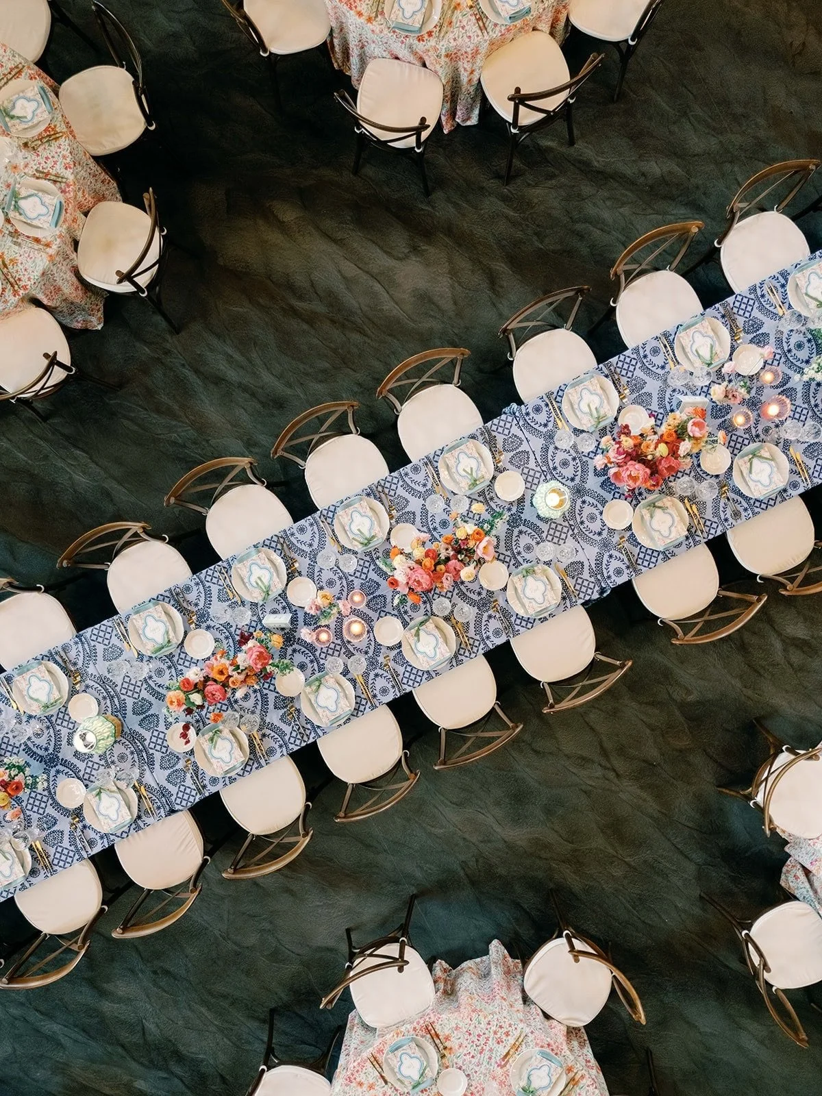 Hannah &amp; Ryan&rsquo;s Black River Barn wedding in South Haven, Michigan was the perfect balance of color, floral charm, and timeless elegance 

From woven cane lounge pieces and soft blue accents, to vibrant garden-style florals in coral, blush, 