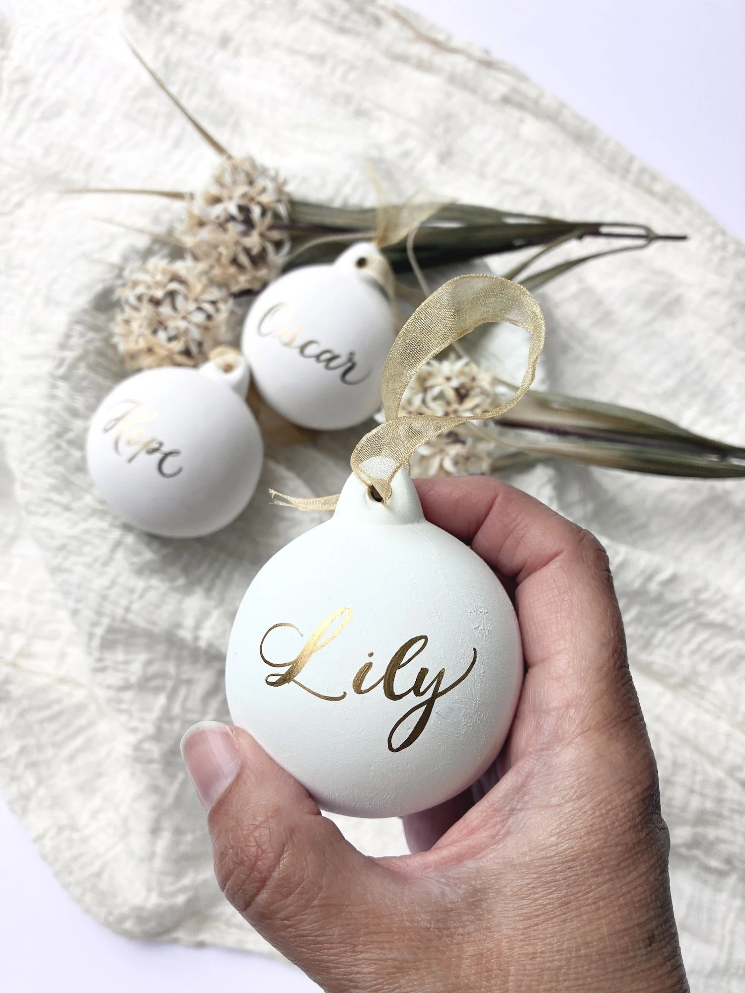 Personalised Christmas bauble gold name on white_0776 copy.jpg