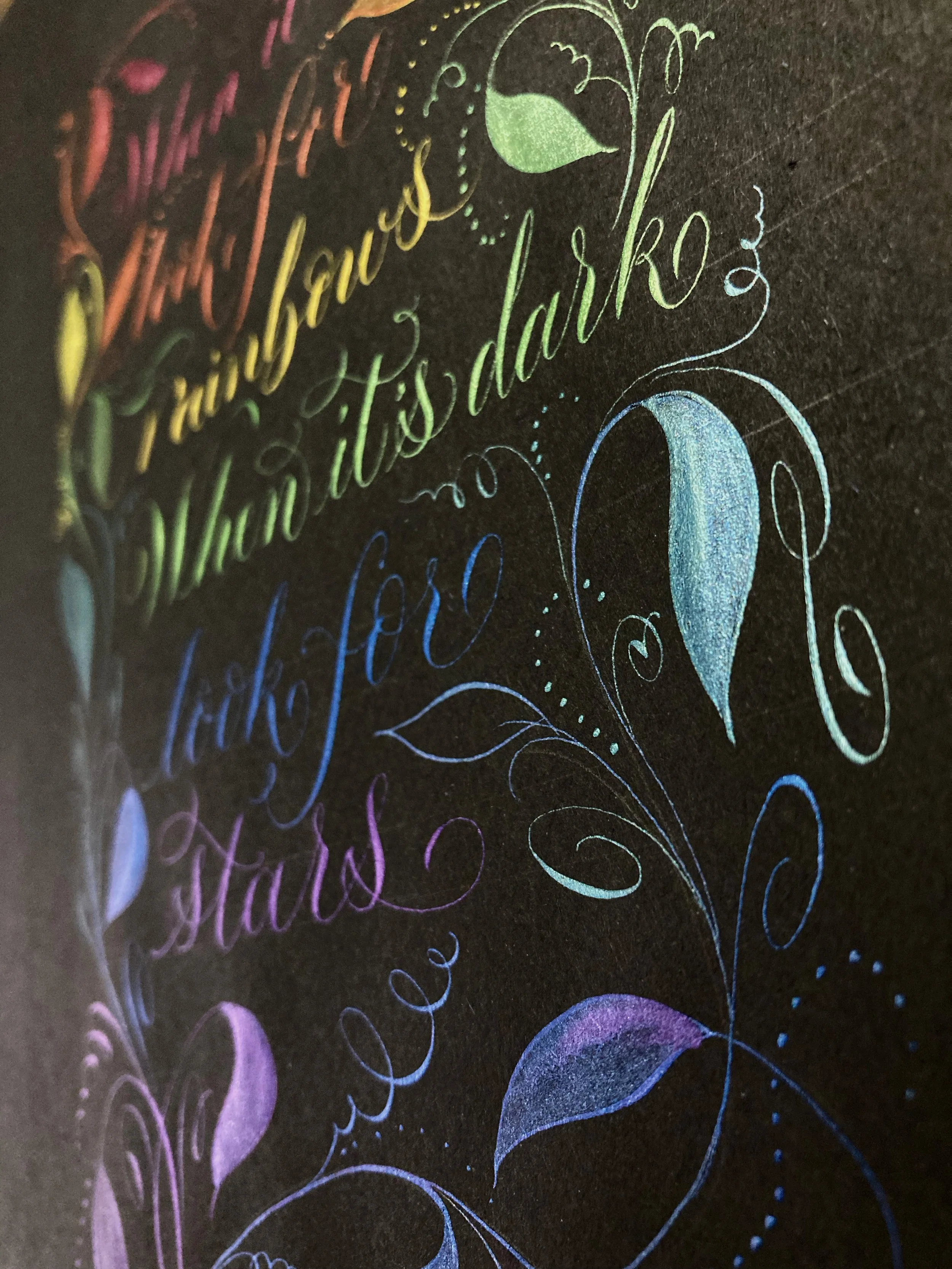 When it's dark look for stars calligraphy quote close up