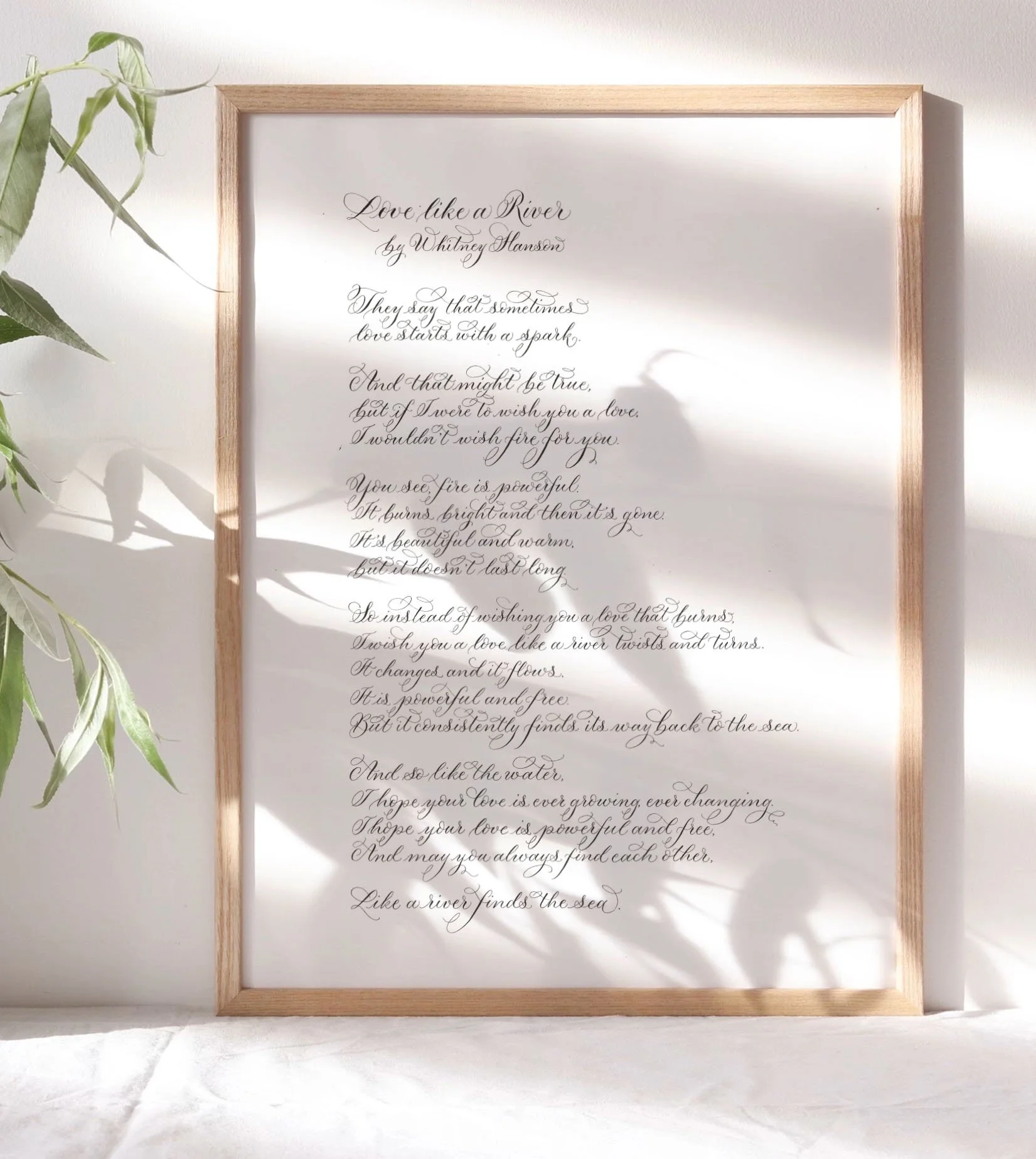Calligraphy poem in a modern script, hand written and framed in a narrow oak frame. By Claire at By Moon and Tide Calligraphy Cumbria UK