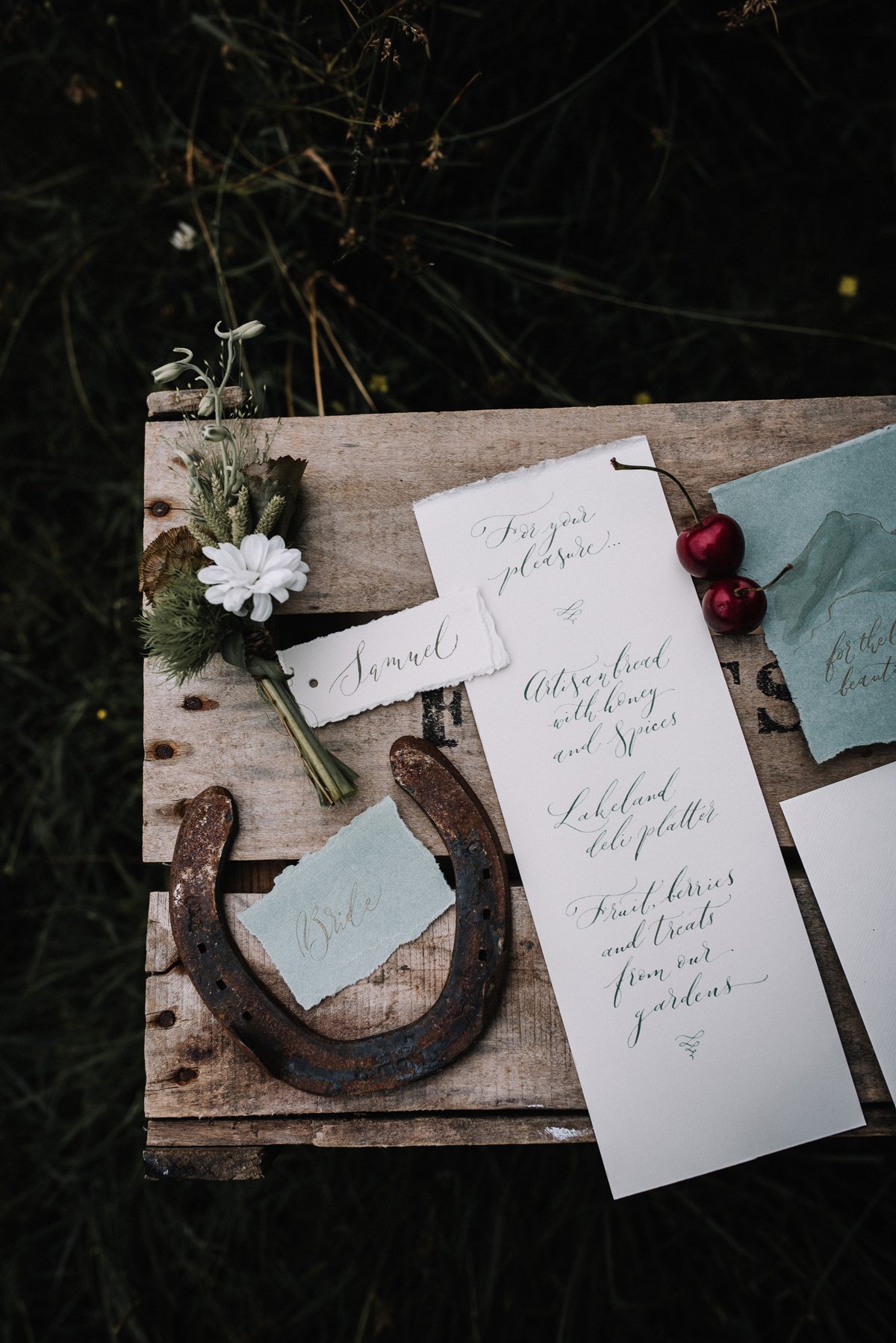 elegant rustic calligraphy wedding menu and place names in an organic style | Oobaloos Photography | By Moon & Tide Calligraphy