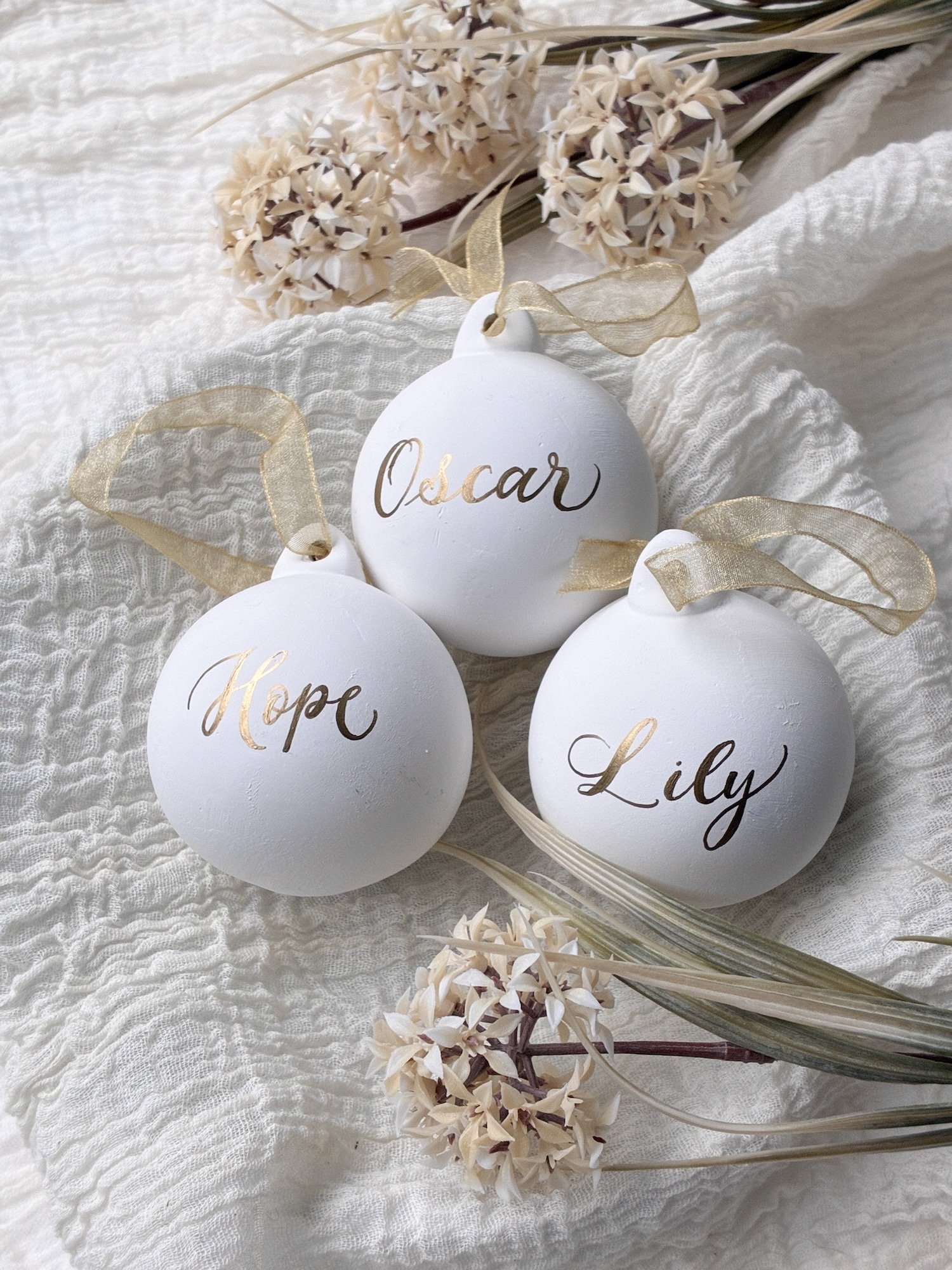 Personalised Christmas bauble gold name on white_0781 copy.jpg