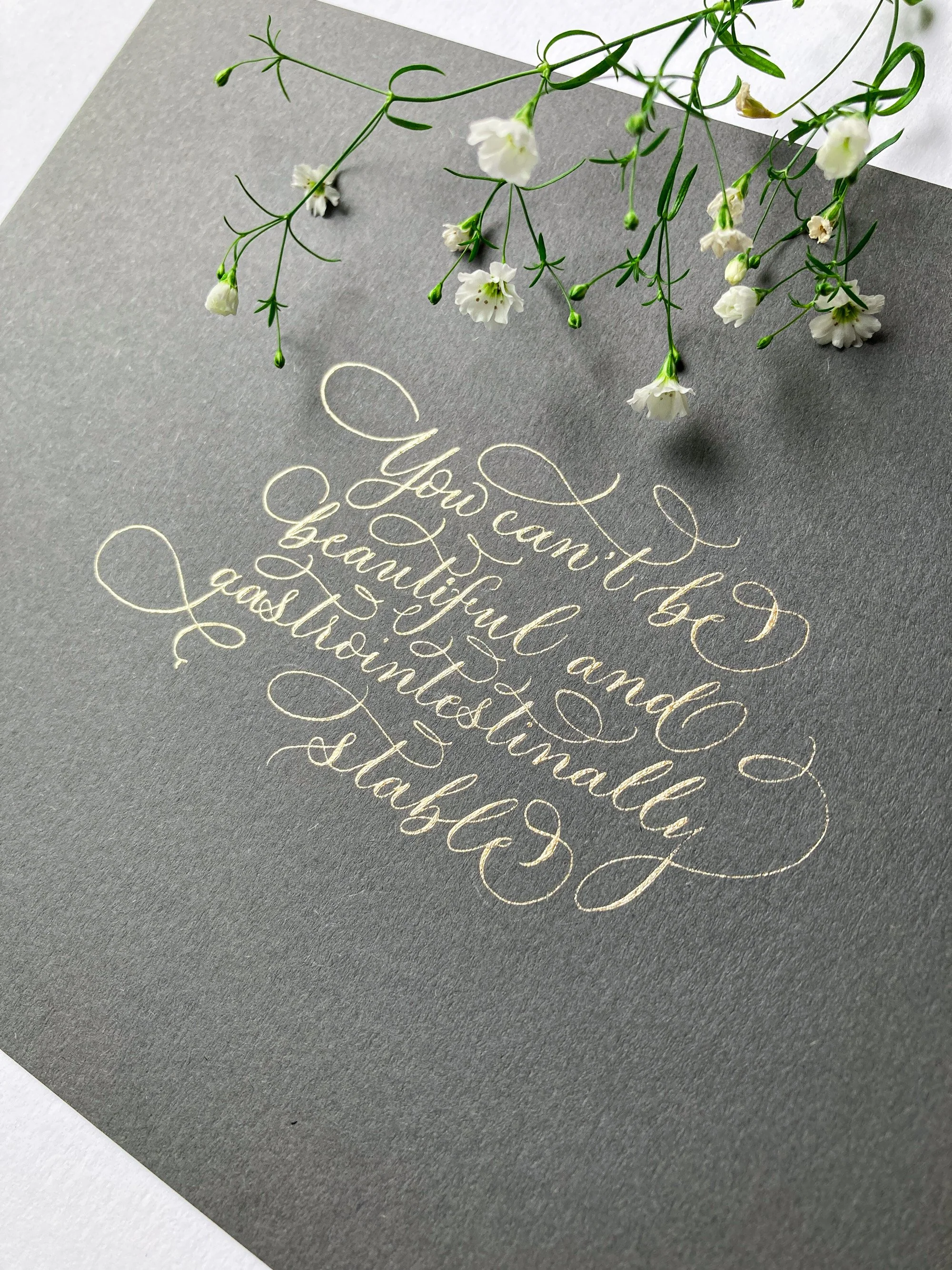 Contemporary calligraphy gift in gold ink on elegant grey paper