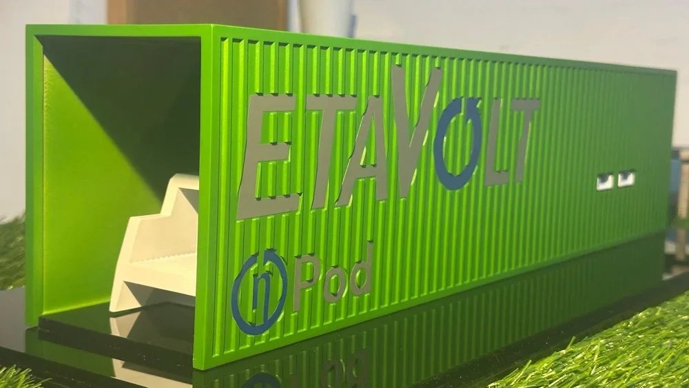 A green signage with the words 'EAT' and 'LOT' and the logo and name of 'iPod' in blue.