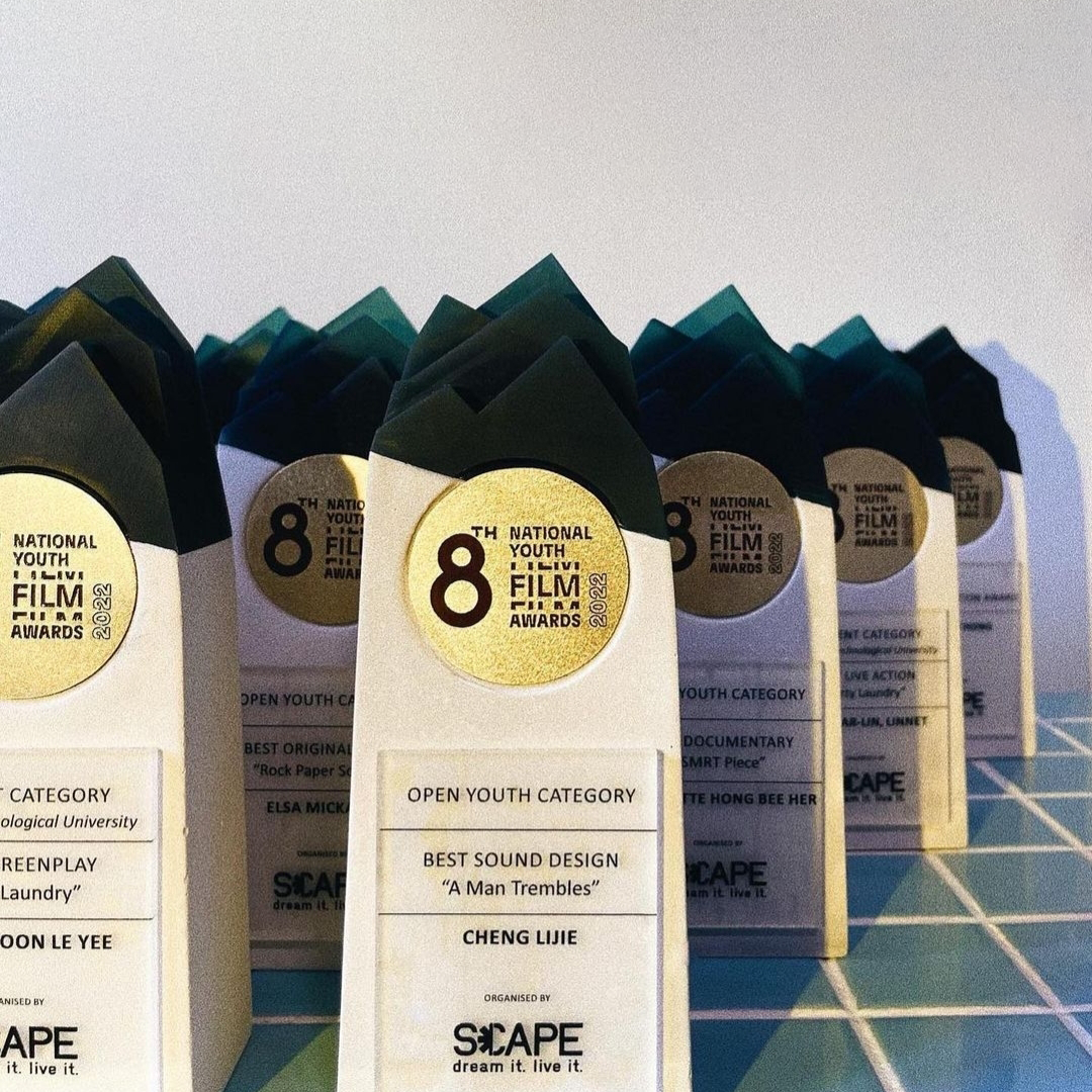 Trophies for the 8th National Youth Film Awards 2022 in various categories, with a focus on the Open Youth Category, Best Sound Design awarded to 'A Man Trembles' by Cheng Lijie, organized by SCAPE.