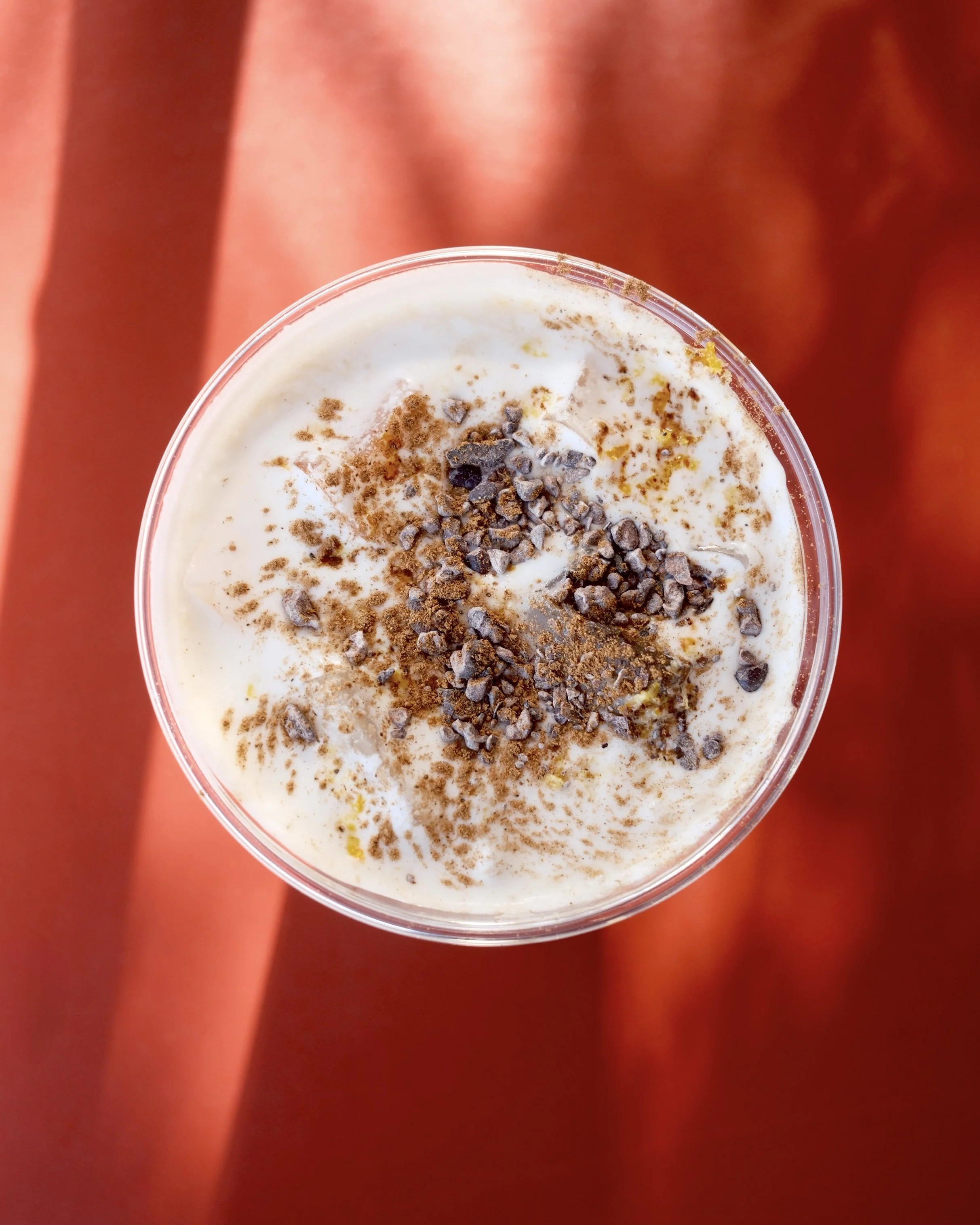 Overhead coffee photography with cocoa powder topping by Los Angeles beverage photographer Matt Francisco
