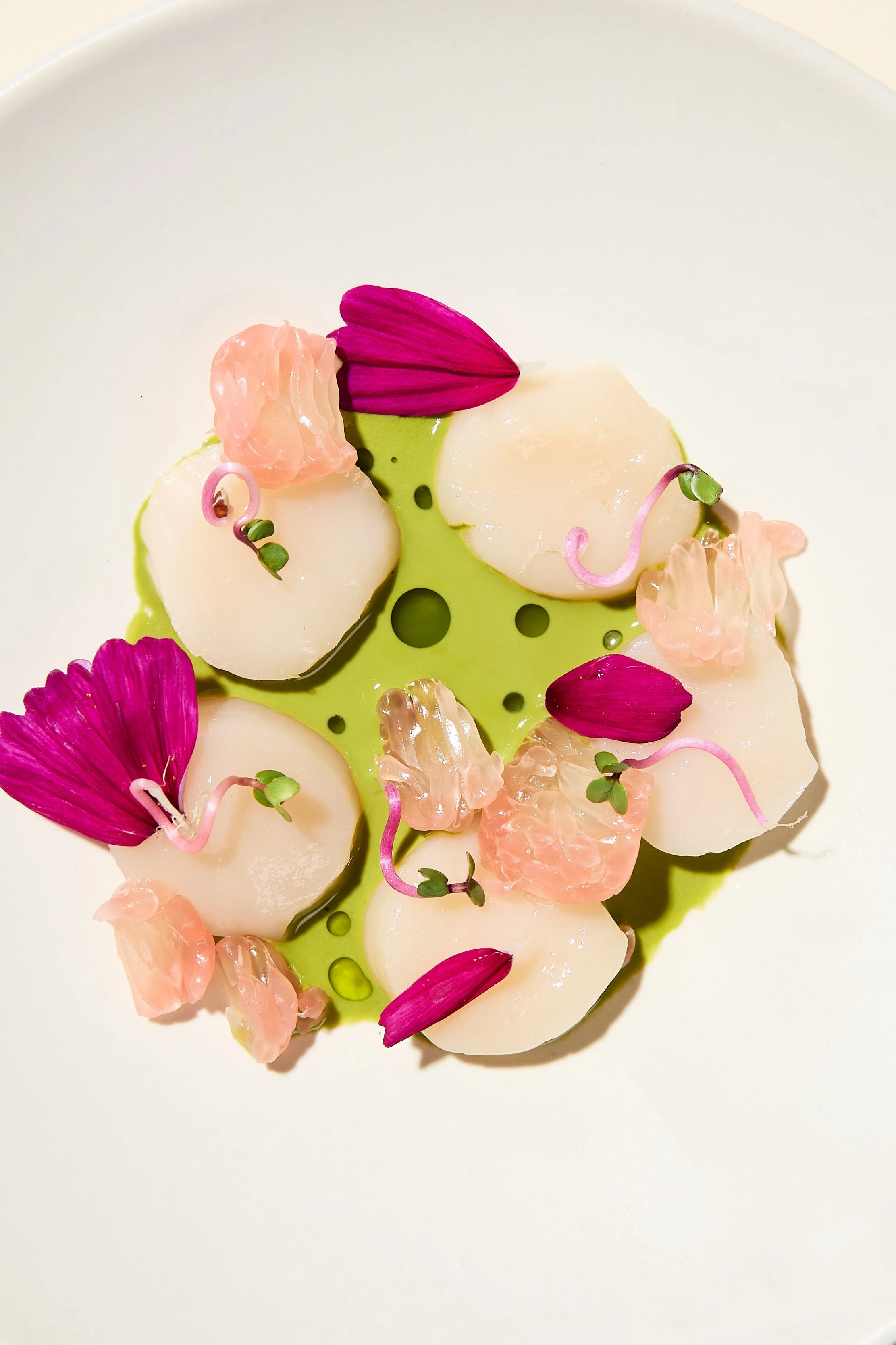 Fine dining scallop food photography with edible flowers by Los Angeles food photographer Matt Francisco
