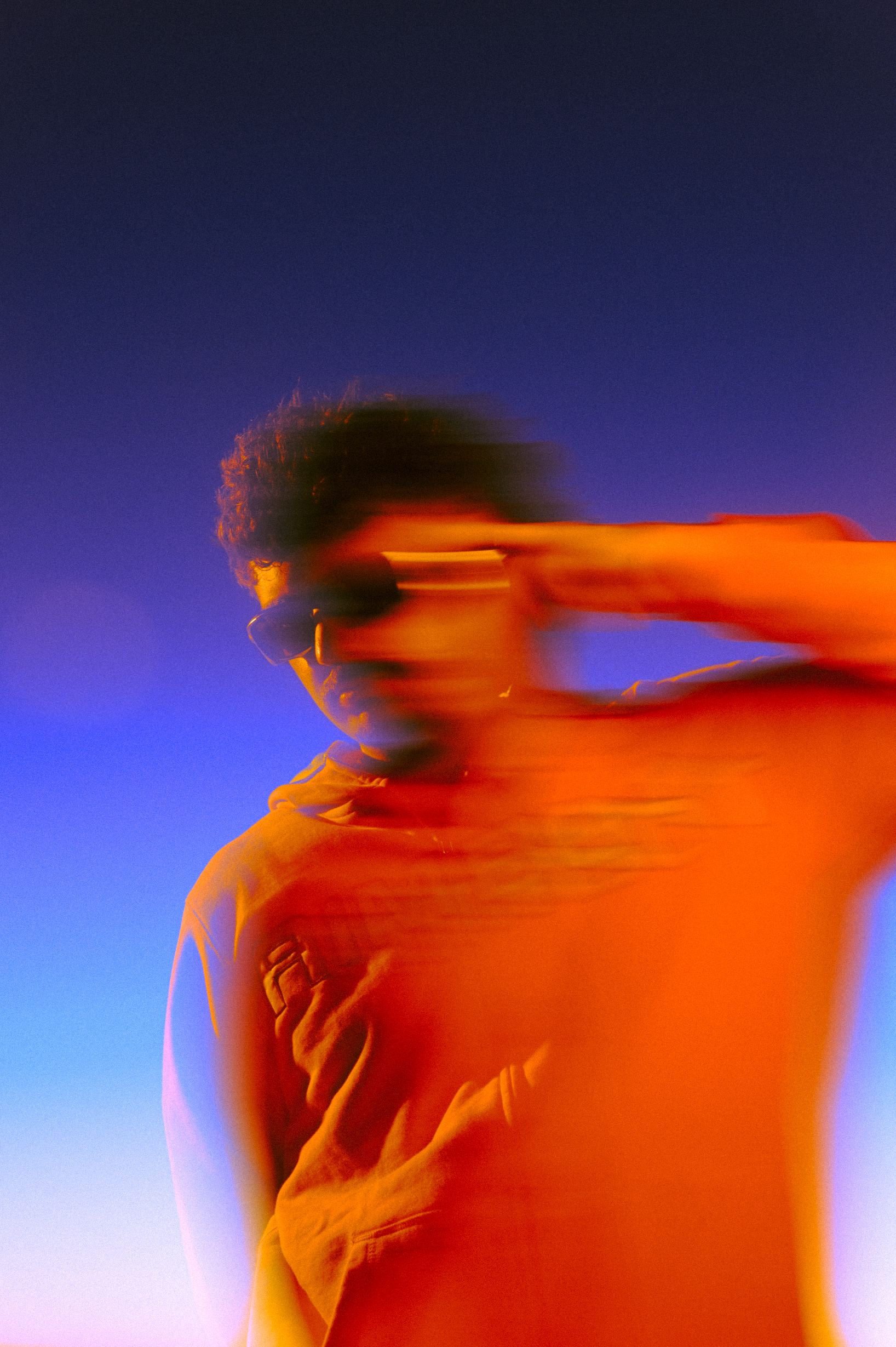 Creative portrait photography with motion blur and colored lighting by Los Angeles photographer Matt Francisco