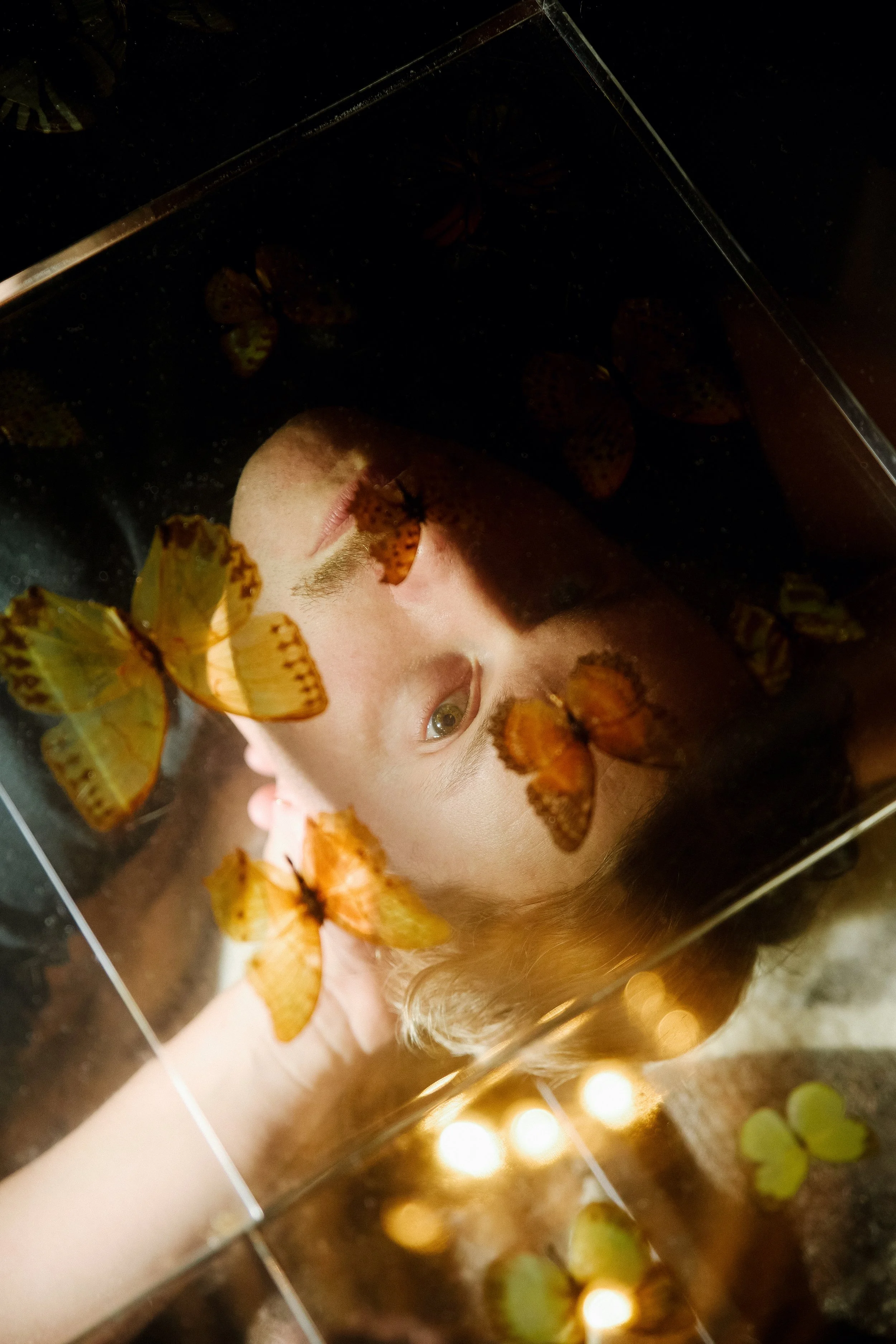 Creative portrait photography of artist Edapollo with orange lighting by Los Angeles portrait photographer Matt Francisco