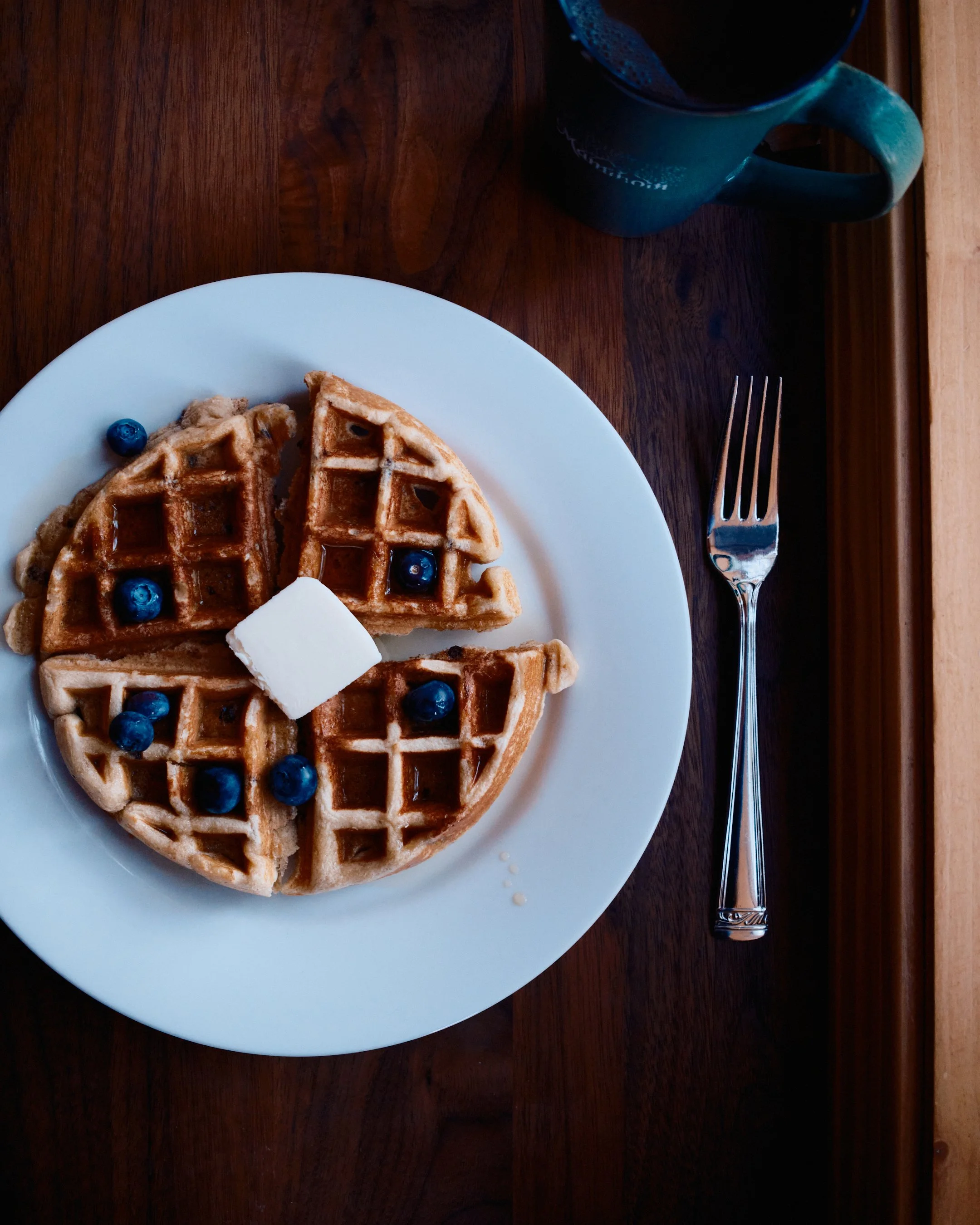 Waffle dessert food photography with maple syrup and blueberries by Los Angeles food photographer Matt Francisco