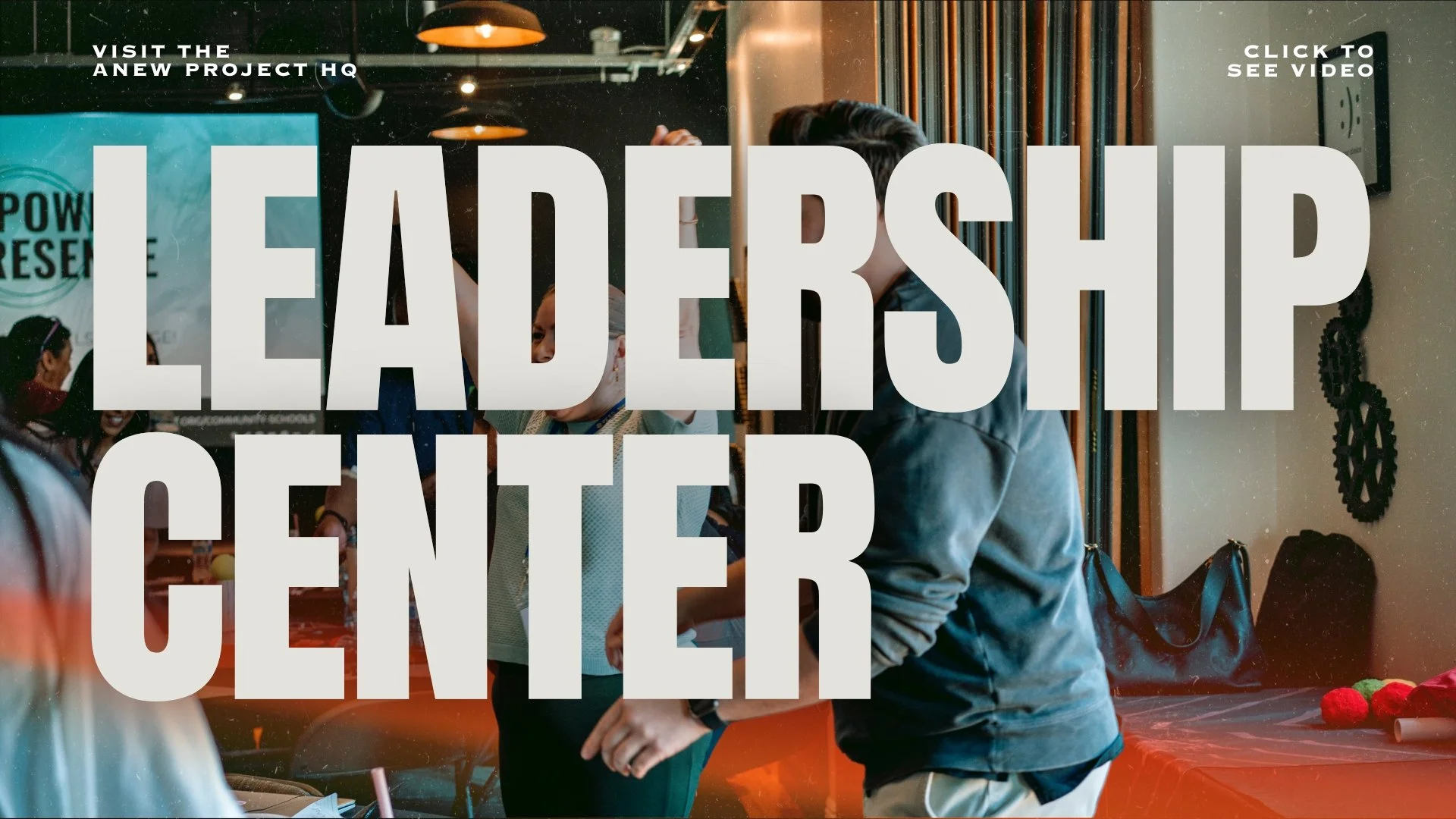 Large text overlay on a photo of people working at a booth, promoting an event or project, with additional smaller text at the top left and right.