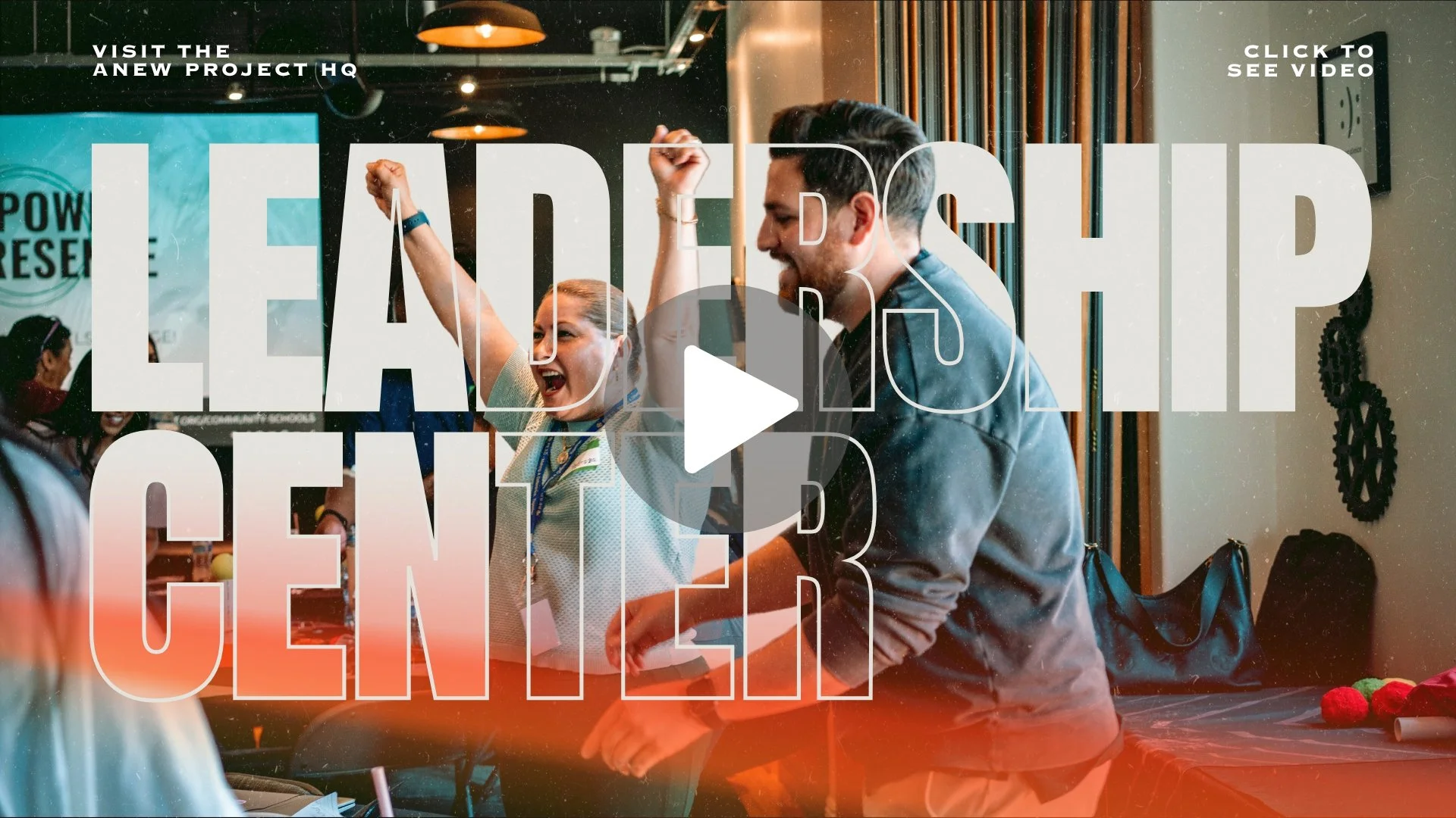 Two people smiling and holding hands at an event with large overlay text reading 'LEADERSHIP CENTER' and promotional messages about visiting the project HQ and watching a video.