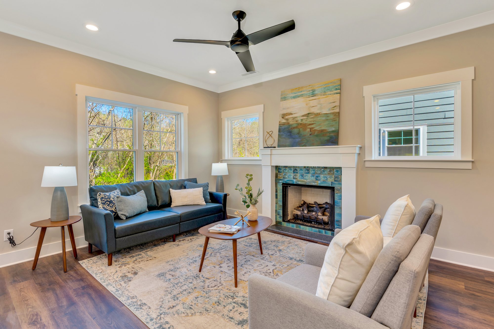 Open living room with gas fireplace at 1366 Thomas Avenue