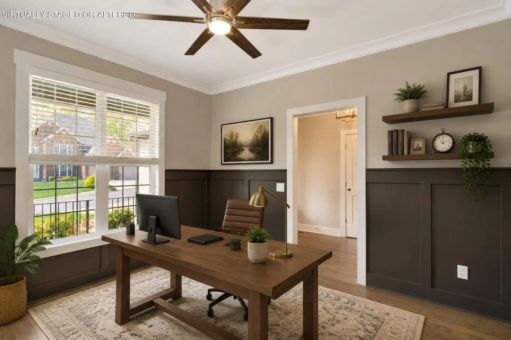 Main-level office with wainscoting, virtually staged