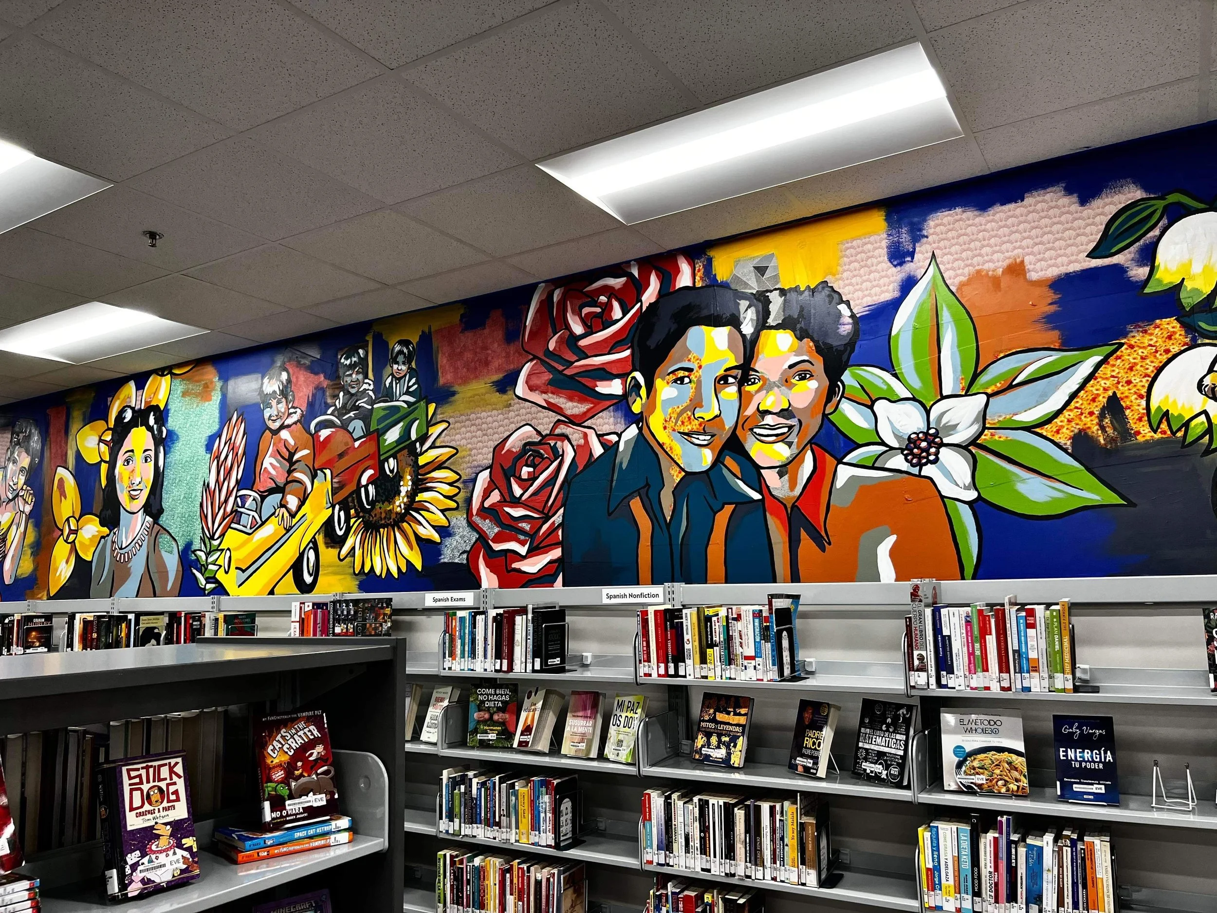 Evergreen Library and Resource Center
Neighborhood History
100 feet in length, spanning two walls
March 2022

This project is was a love letter to an historic neighborhood in Wichita. It layers fabric and paint as well as a collage style to show all 