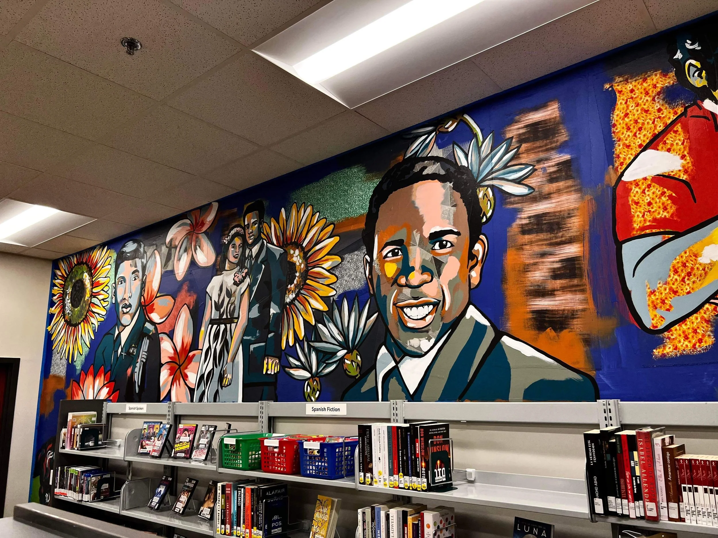 Evergreen Library and Resource Center
Neighborhood History
100 feet in length, spanning two walls
March 2022

This project is was a love letter to an historic neighborhood in Wichita. It layers fabric and paint as well as a collage style to show all 