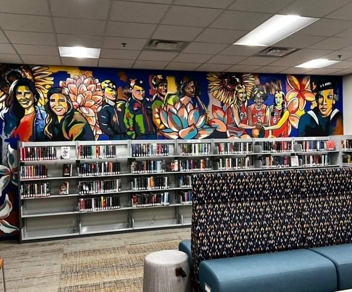 Evergreen Library and Resource Center
Neighborhood History
100 feet in length, spanning two walls
March 2022

This project is was a love letter to an historic neighborhood in Wichita. It layers fabric and paint as well as a collage style to show all 