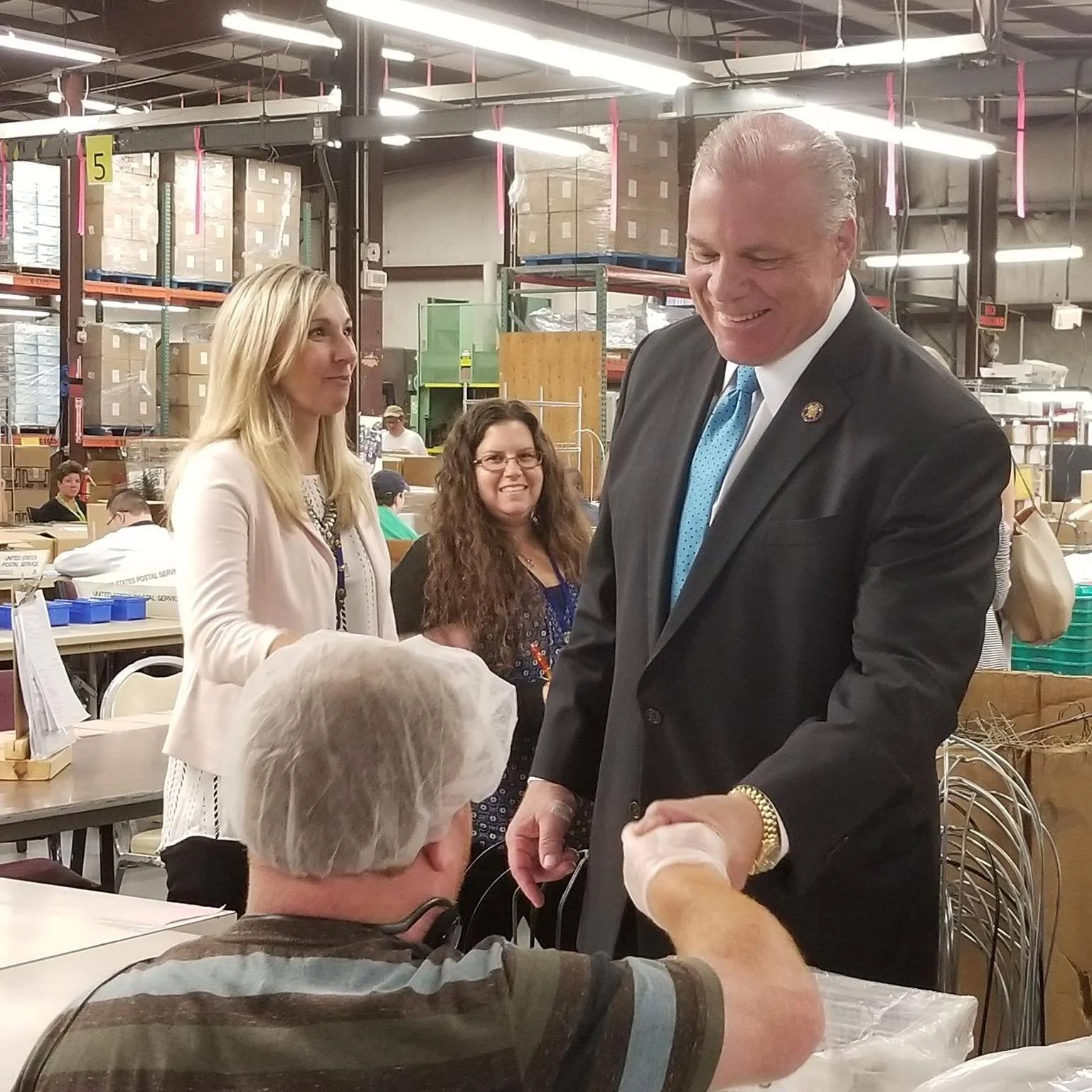 SENATOR SWEENEY TOURS A SHELTERED WORKSHOP 