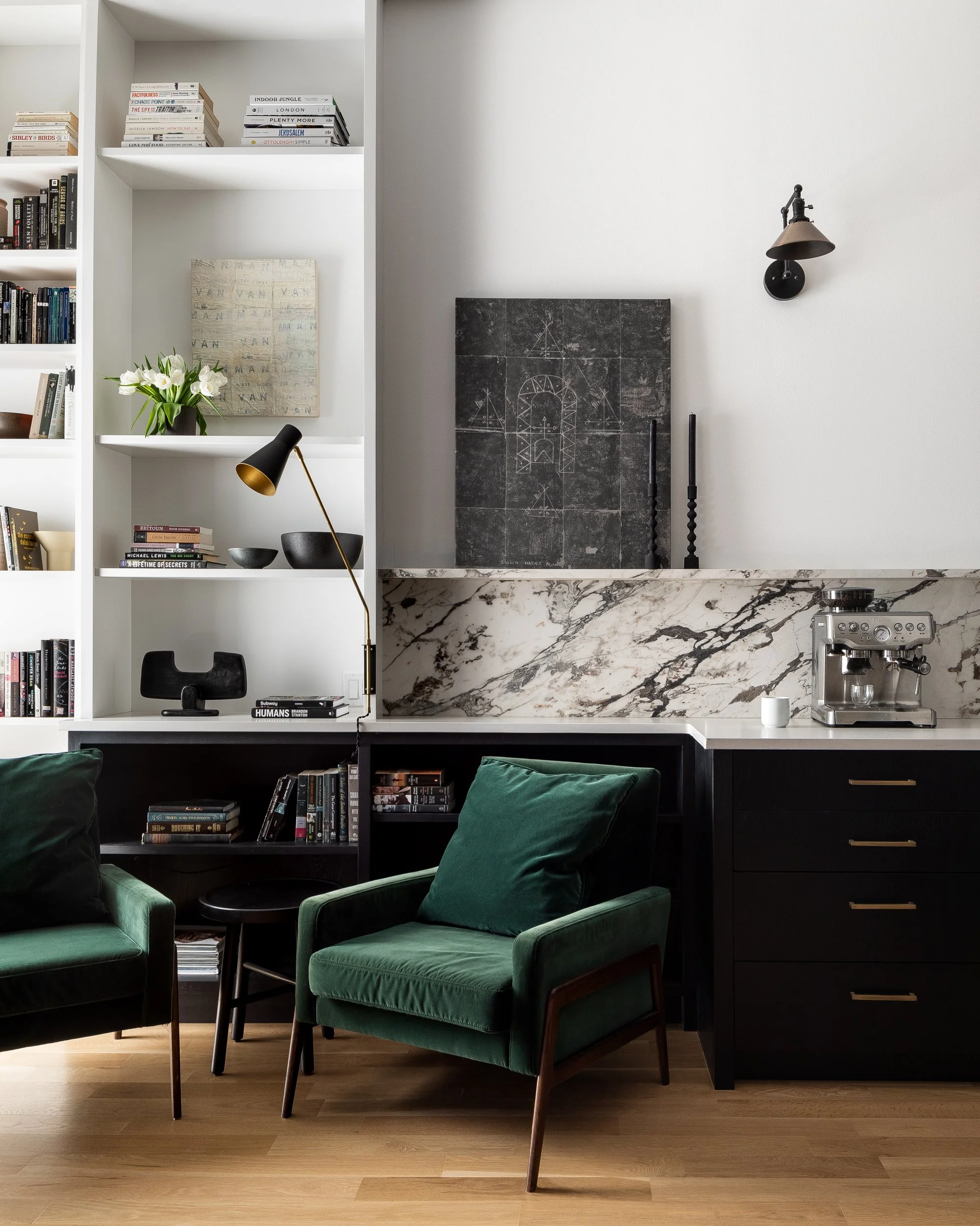 Coffee and lounge nook designed by Elaine Santos Design with table lamp and sconce