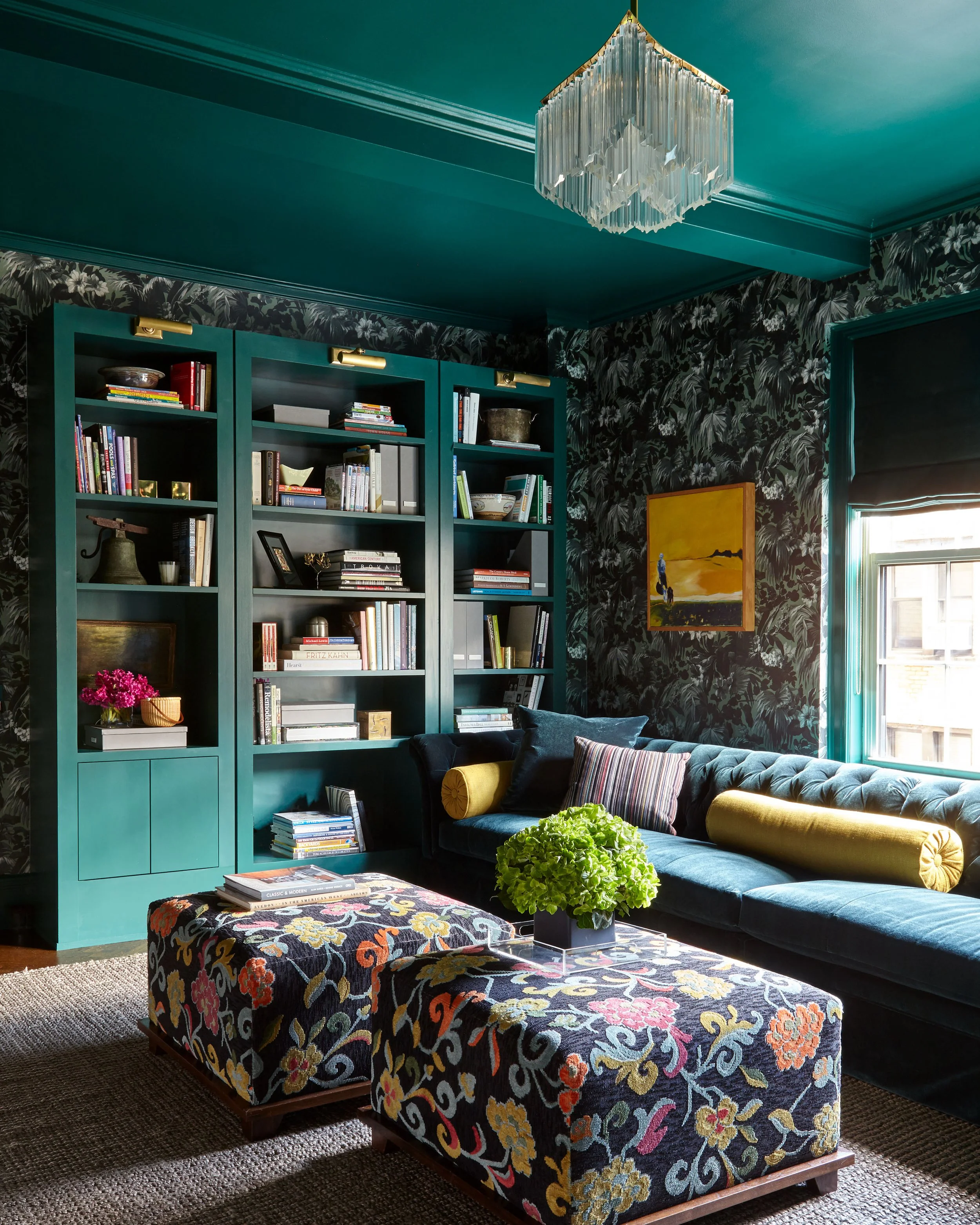 Library design by Elaine Santos Design featuring emerald green ceiling, floral wallpaper, and bookshelves