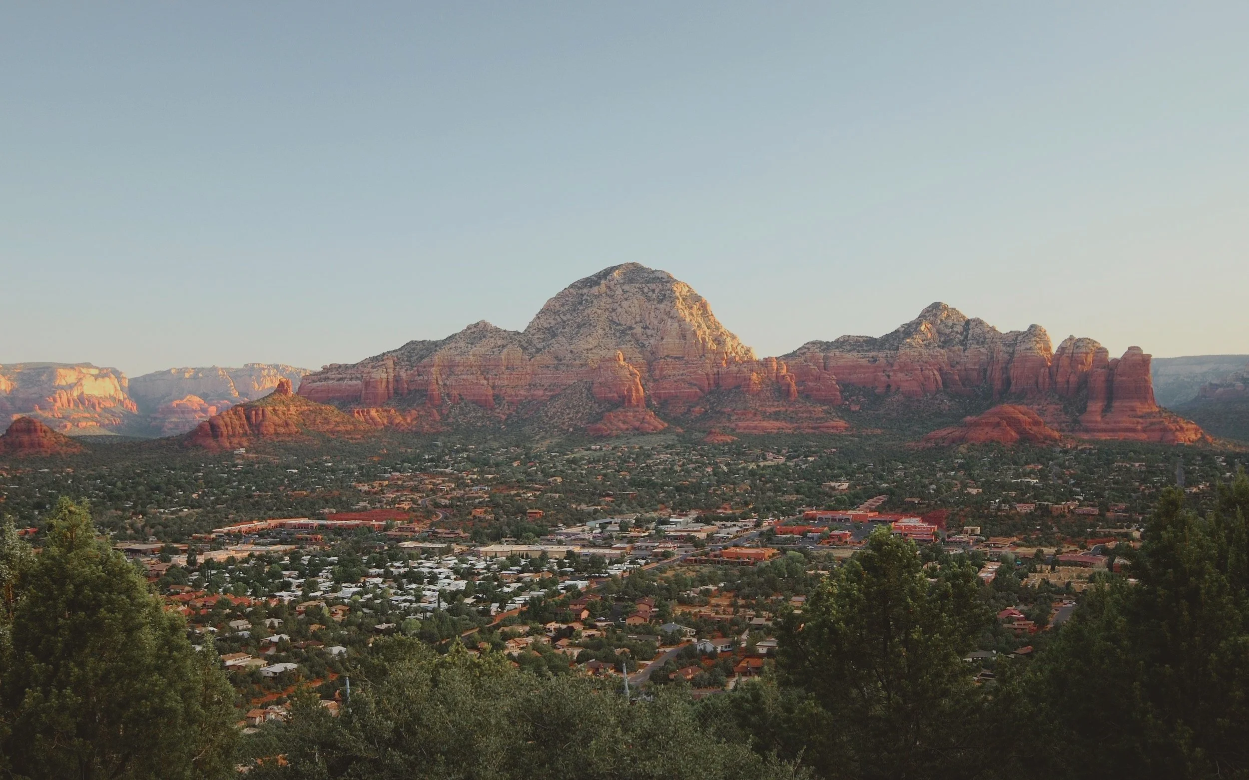 Early morning view from Airport Mesa over Sedona toward Capitol Butte and Coffee Pot Rock.